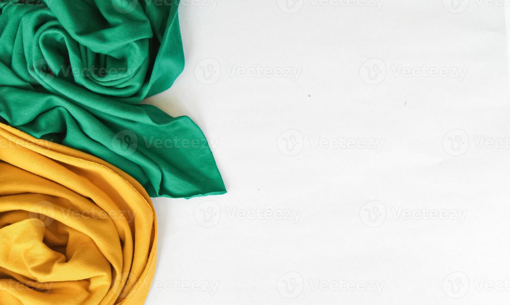 green and yellow fabric with negative space area photo