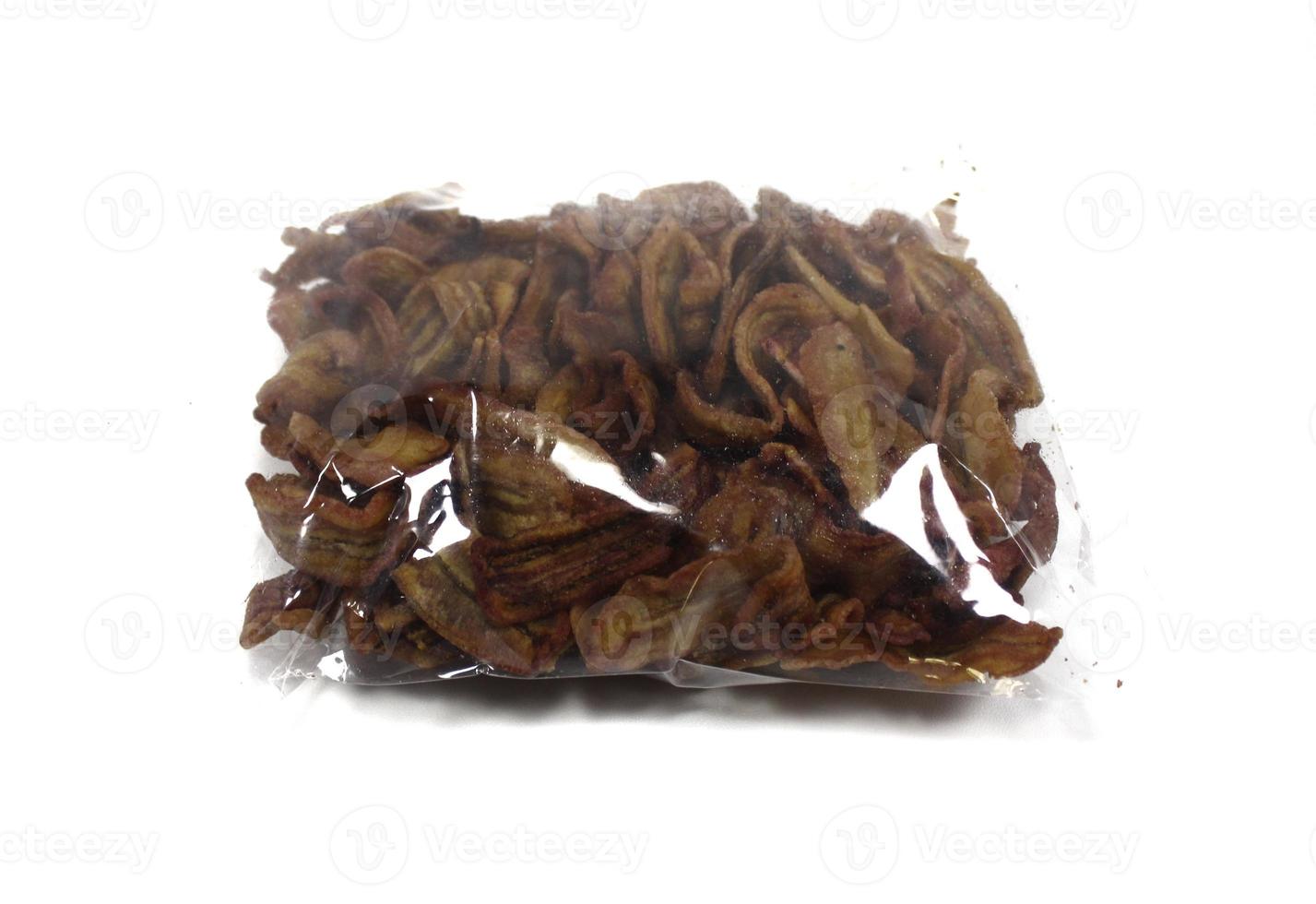 Banana chips in plastic packaging 20481309 Stock Photo at Vecteezy
