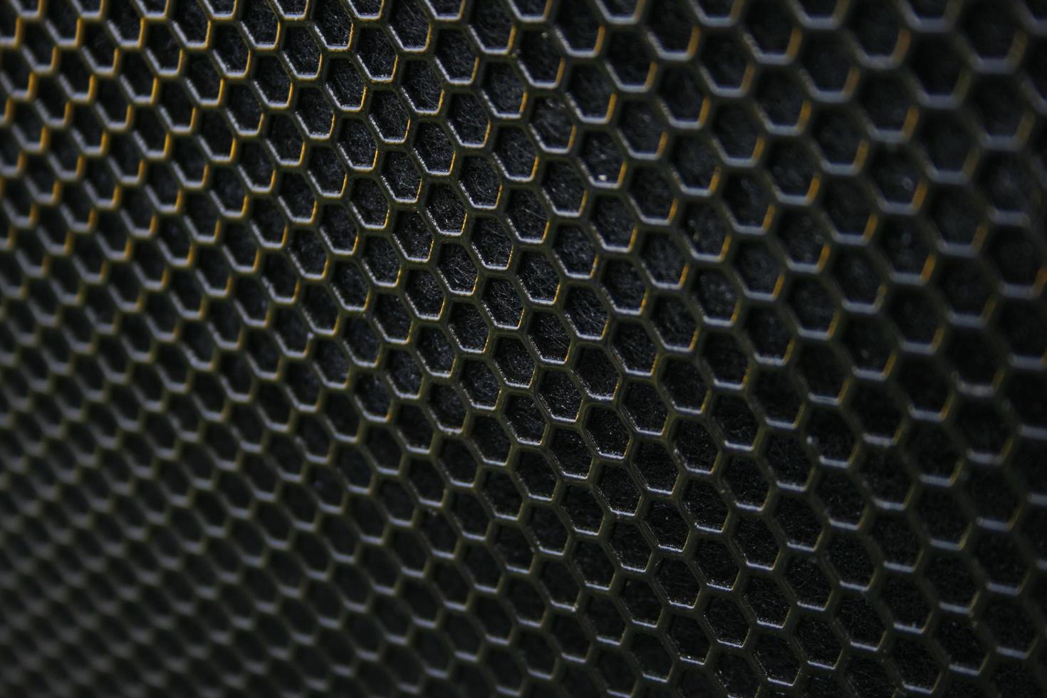 negro hierro altavoz cuadrícula textura. industrial antecedentes foto