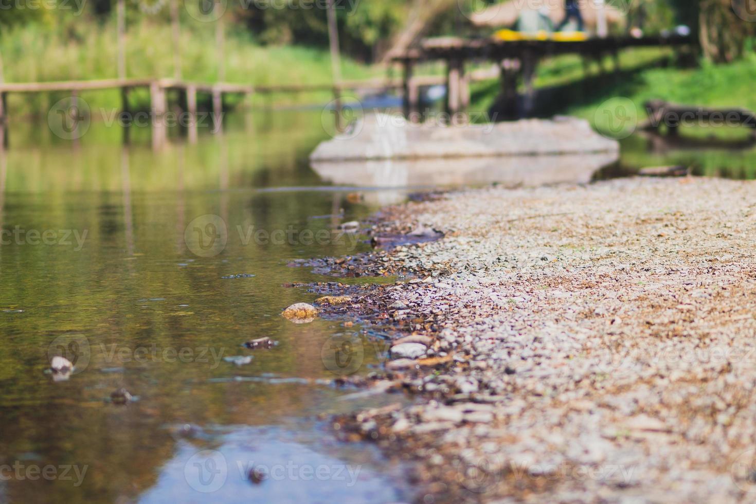 Stone and river at Utaradit, Thailand. photo