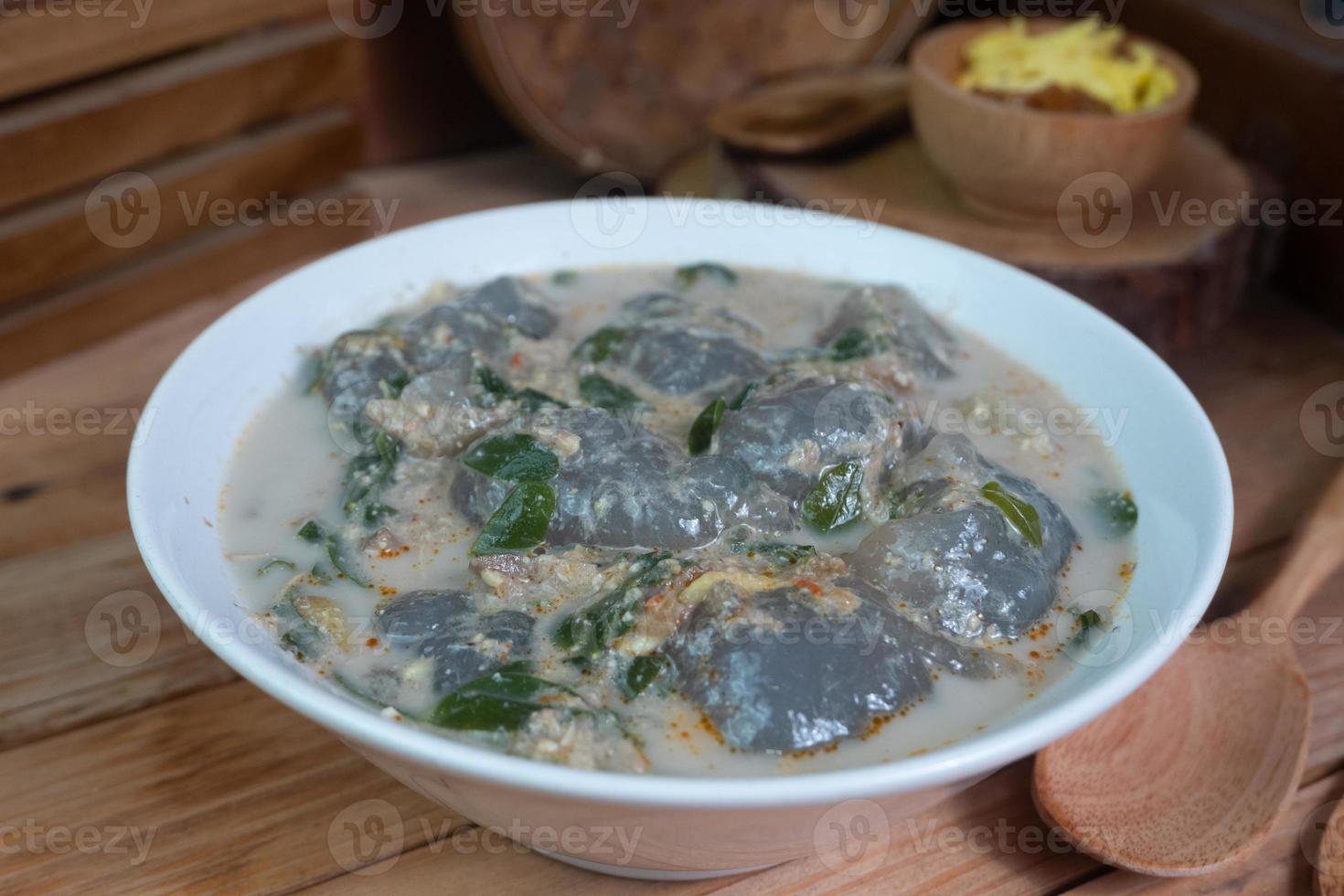 selective focus on food kapurung is a soup with a slightly sour and fresh taste originating from Sulawesi, this food is made from sago flour or starch with fish water broth, soft focus photo