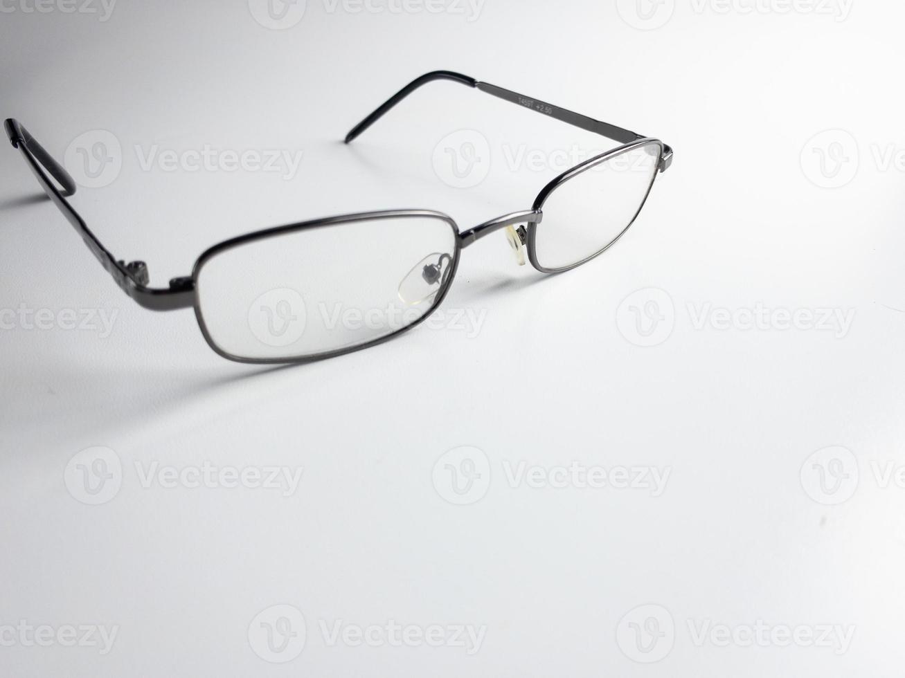 glasses for reading and impaired vision isolated on white background. selected focus photo