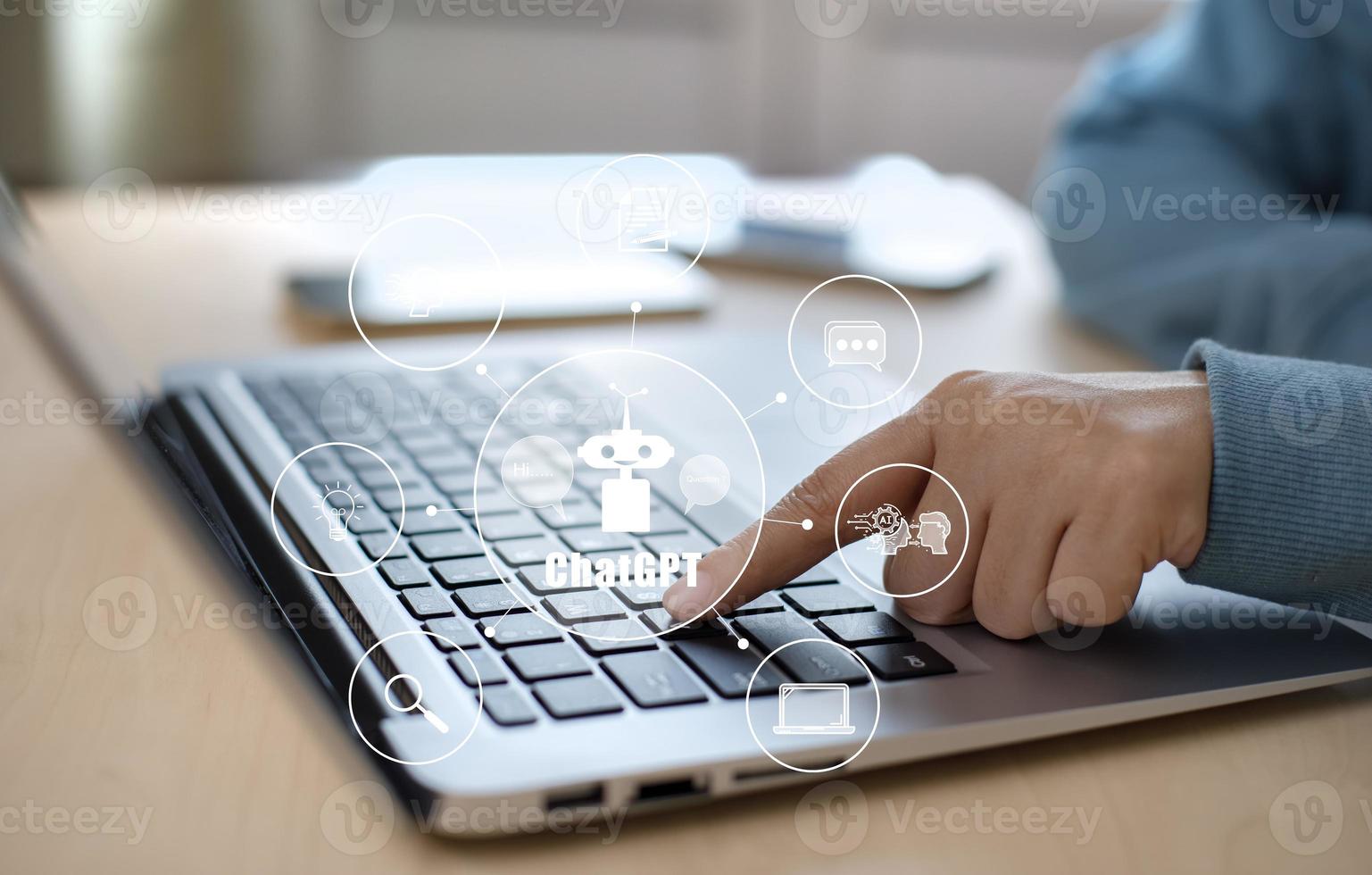 Man using Laptop and touch bar Chat bot Chat with AI, Artificial Intelligence, System Artificial intelligence an artificial intelligence chatbot, Digital chatbot, Robot application, conversation photo