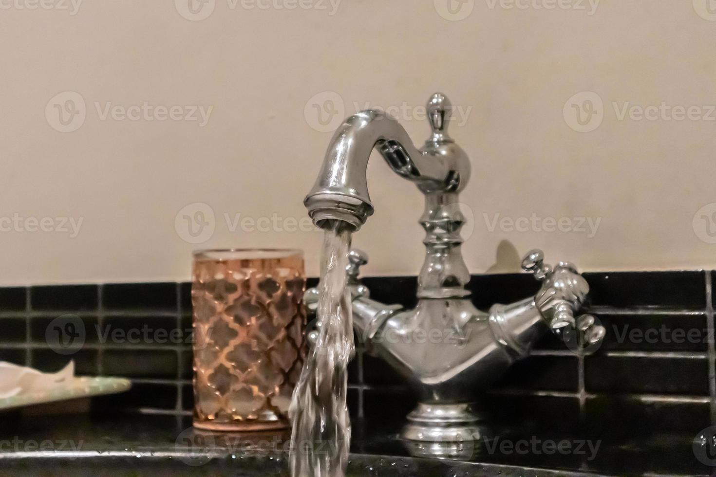 Luxury vintage faucet in the bathroom photo