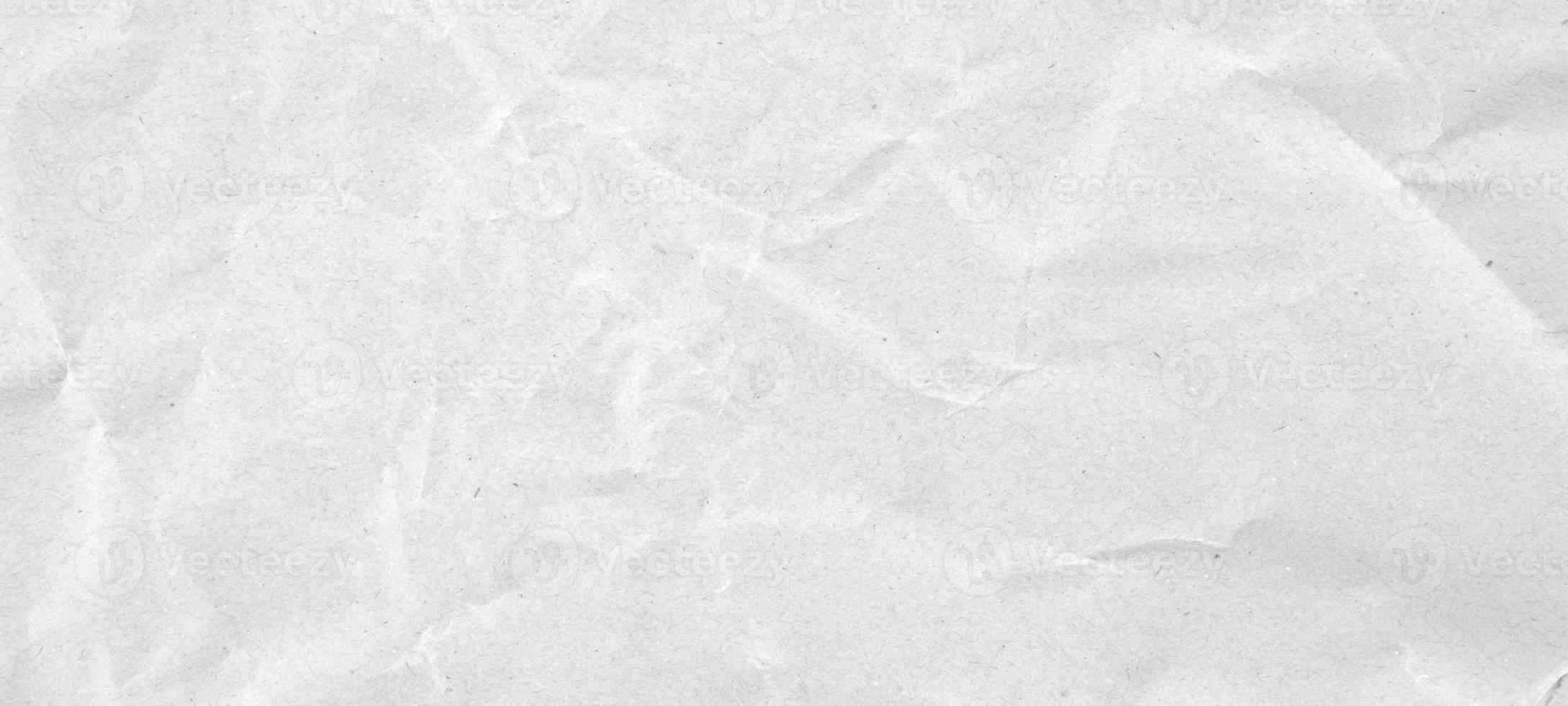 Abstract white crumpled and creased recycle paper texture background photo