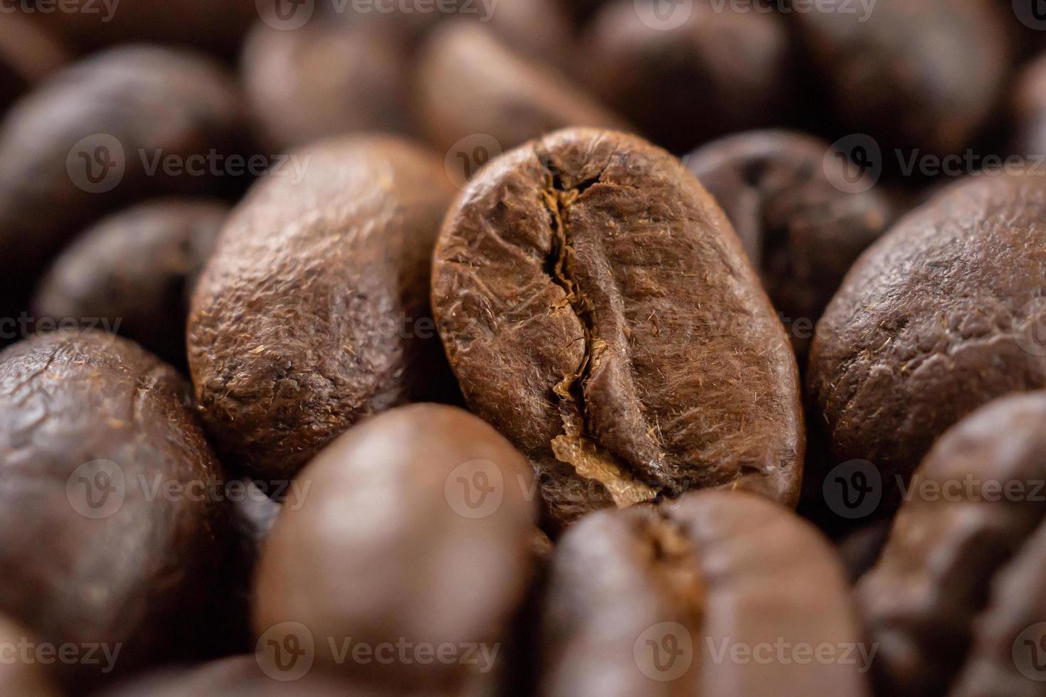 Fresh roasted brown coffee beans background photo