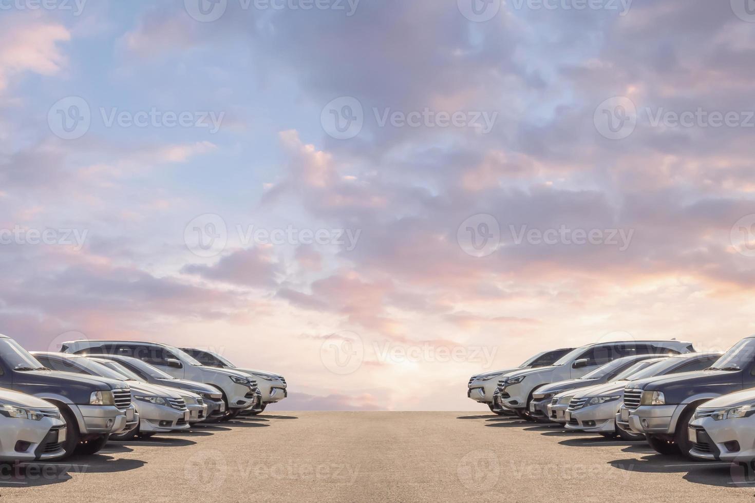 Lot of used car for sales in stock with sky and clouds photo