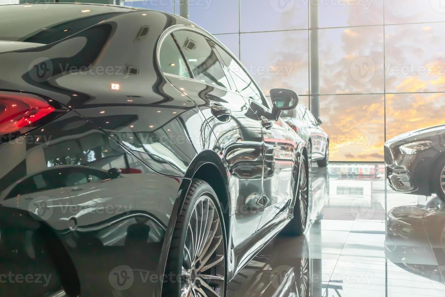 new car in the car dealership showroom with blue sky photo