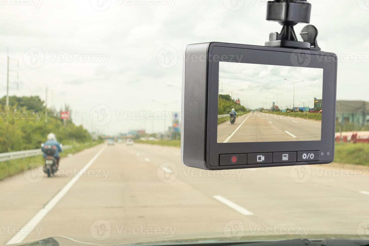 Car CCTV camera video recorder for driving safety on the road photo