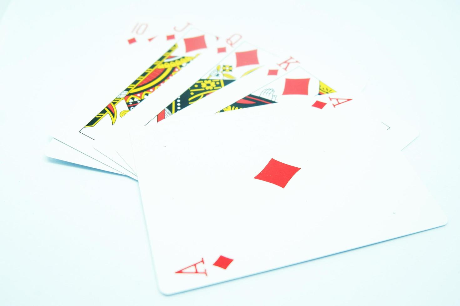 Diamond Royal Flush ,All the same suit, sequence A-K-Q-J-T in white background photo