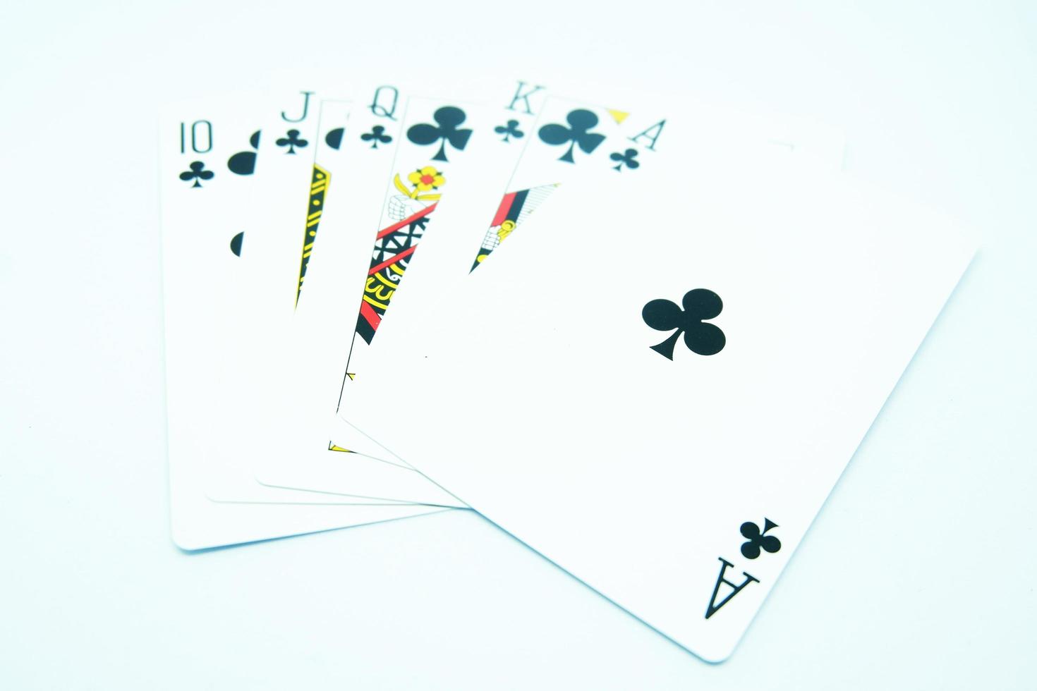 Clubs Royal Flush on white background photo