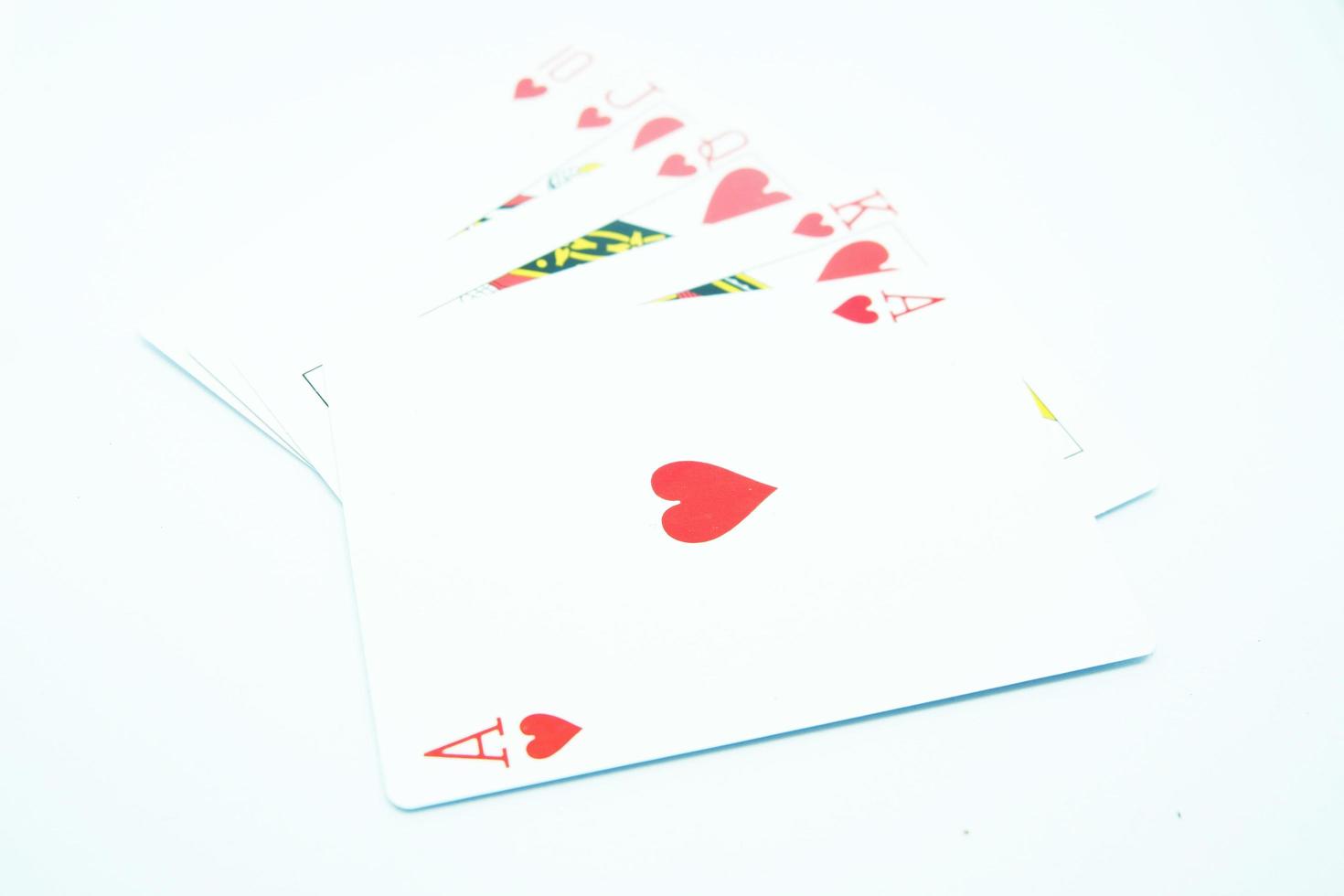Royal Flush of Heart All the same suit, sequence A-K-Q-J-T in white background photo
