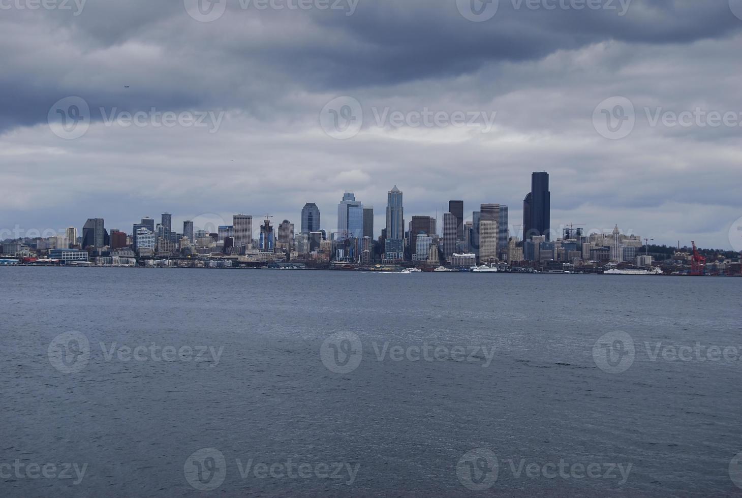 Skyline of Seattle under heavy clouds photo