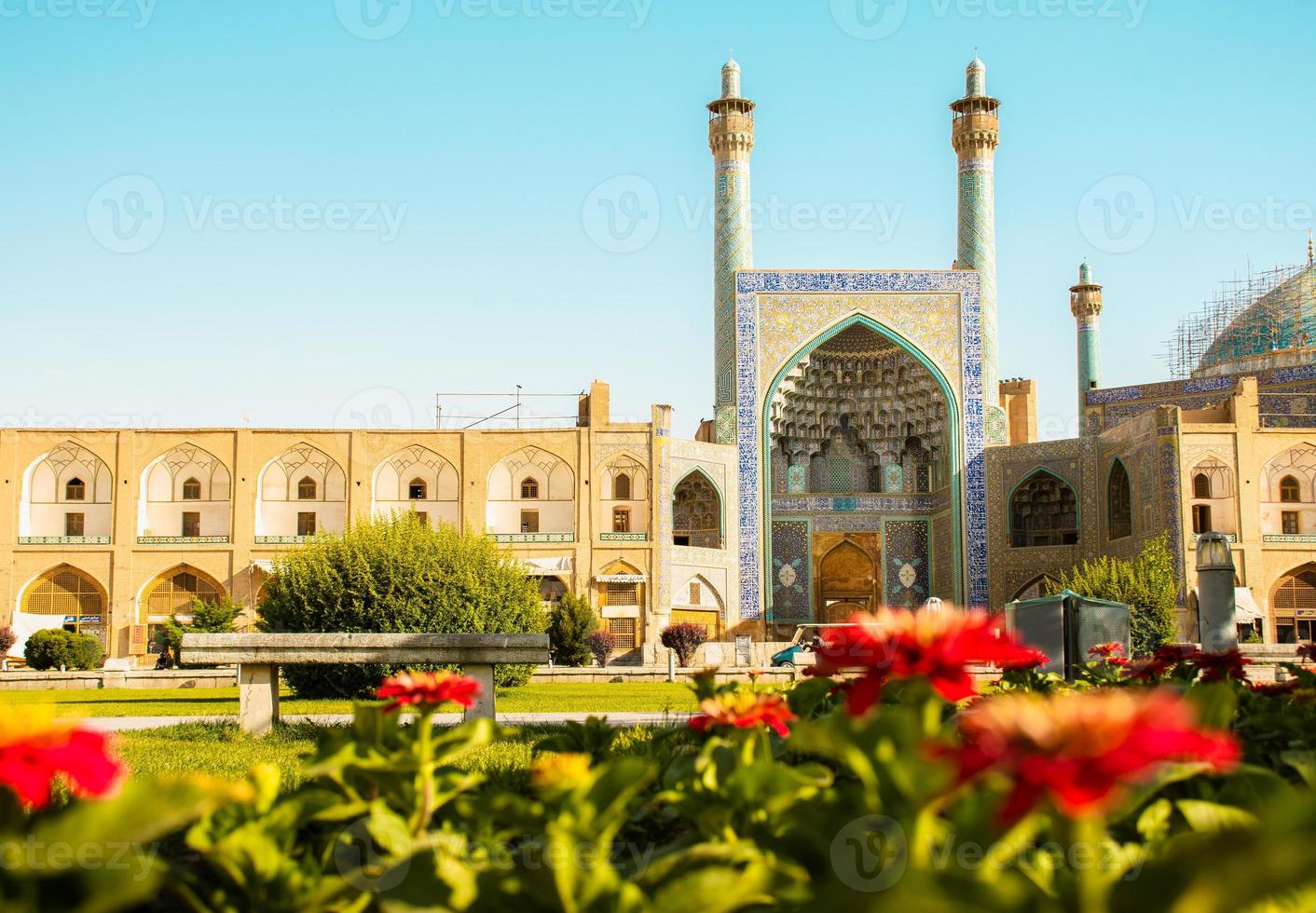 Isfahan, Iran - 15th may, 2022 - Entrance into the Friday Mosque  , Jame Mosque Of Isfahan with garden foreground photo