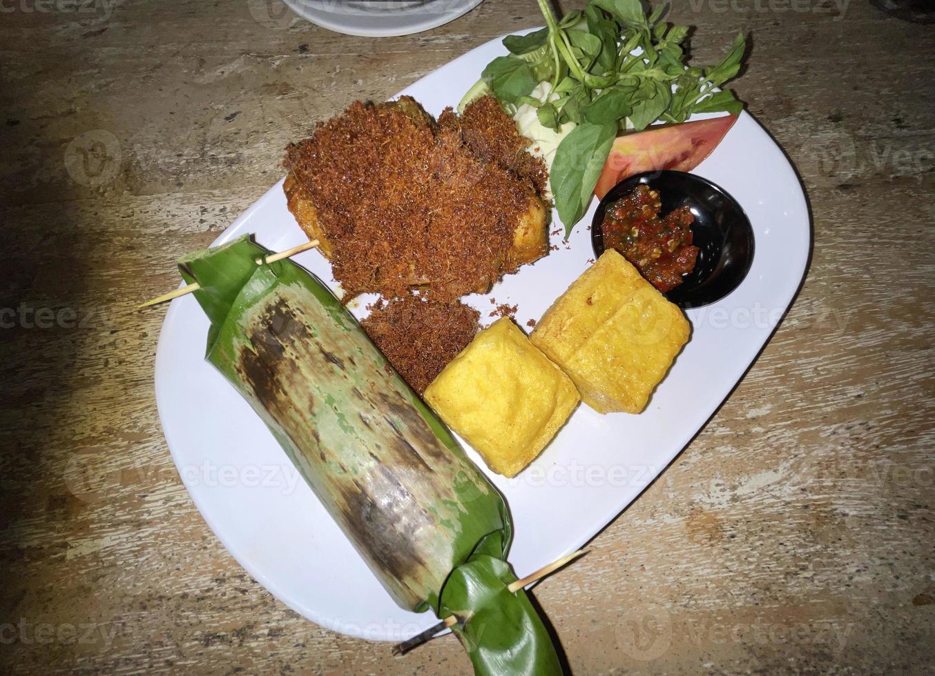 Grilled Rice wrapped in Banana Leaf - Indonesian Traditional Food, Nasi Bakar photo