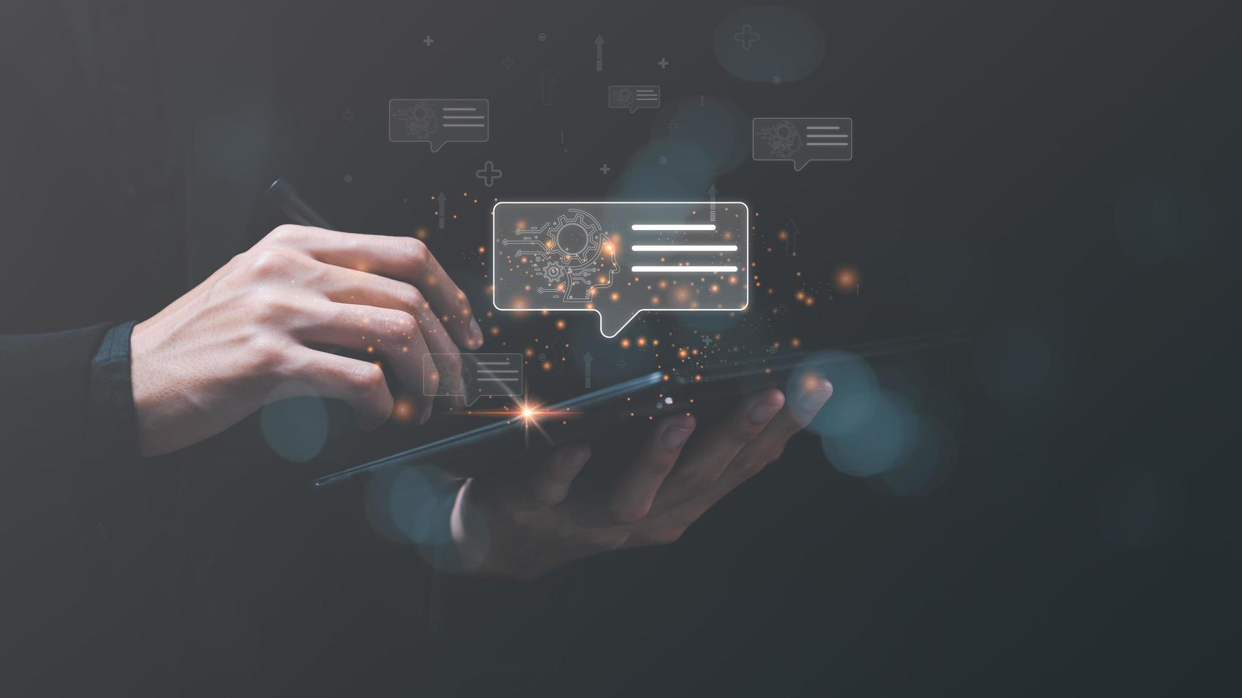 Businessman working on a tablet ,artificial intelligence ,Communication and interaction with technology ,Big data collection to process results ,Chatbot Chat with AI ,ChatGPT ,robot application photo