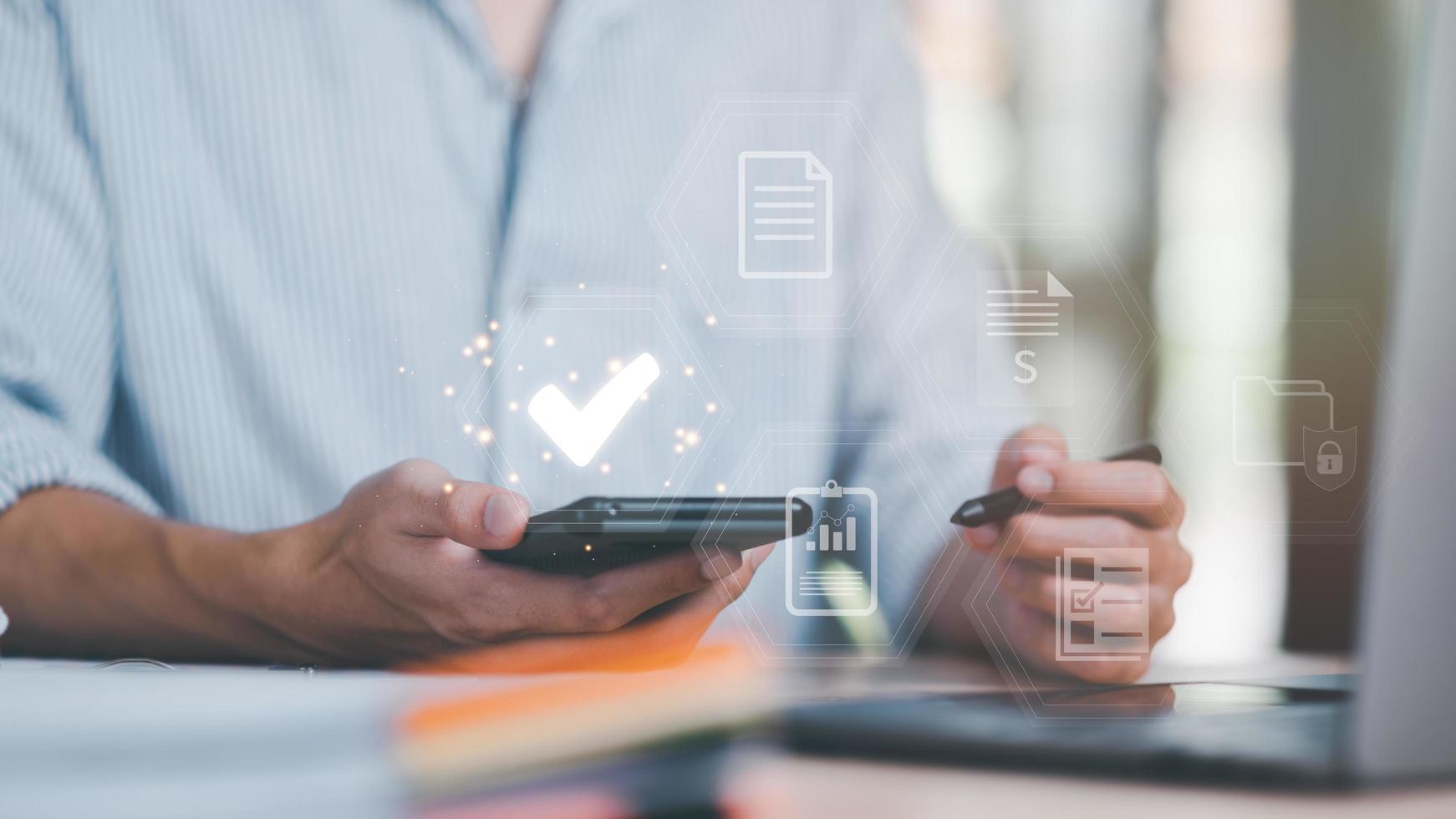 A man showing check mark icon ,concepts of code of conduct, rules and policies, corporate governance documents ,terms and conditions ,Documents with check box items ,Verification process for accuracy photo