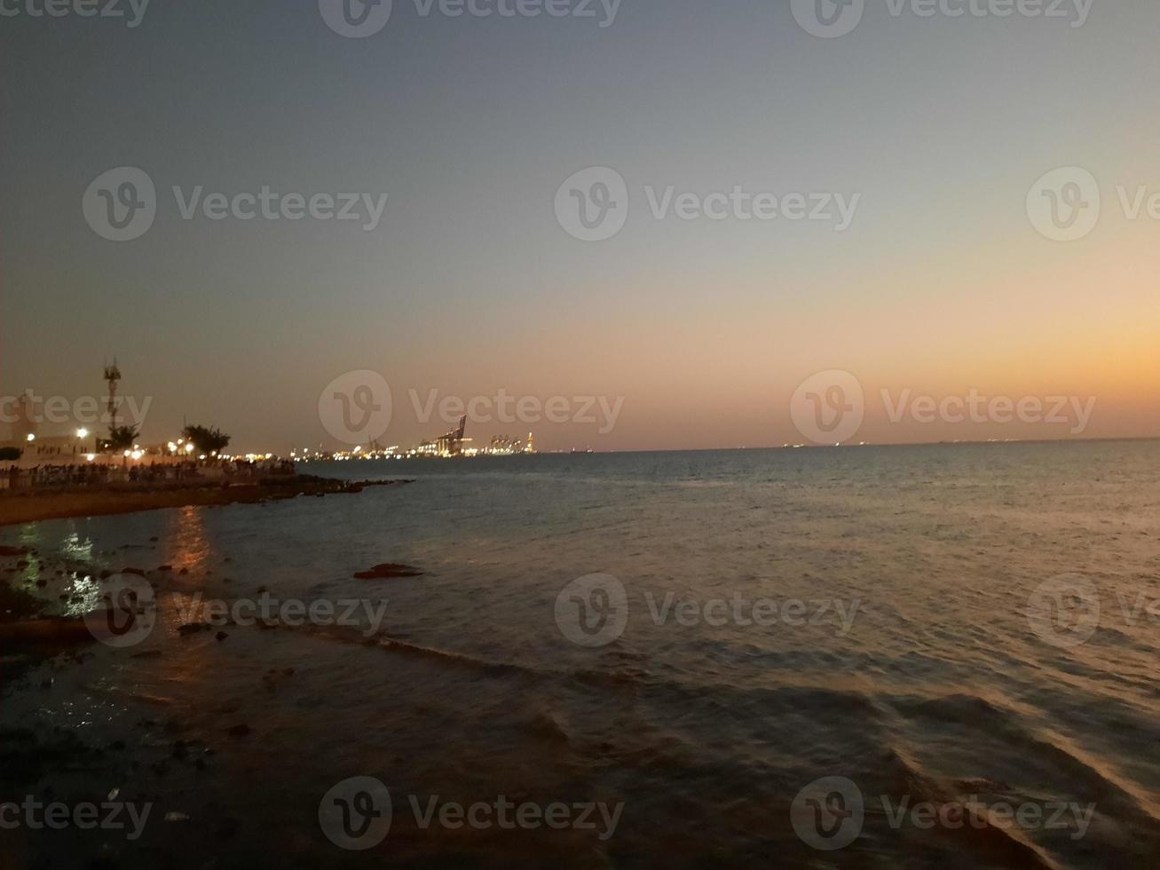 Beautiful evening and colorful sunset at Jeddah corniche. photo