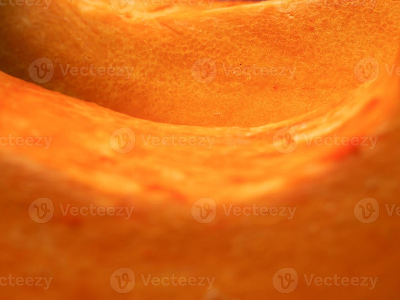 Yellow flesh of a raw pumpkin close up photo