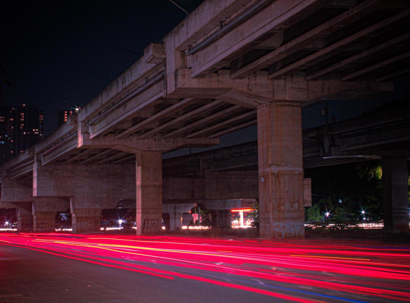 motion photography in under bridge at night Bekasi Indonesia photo