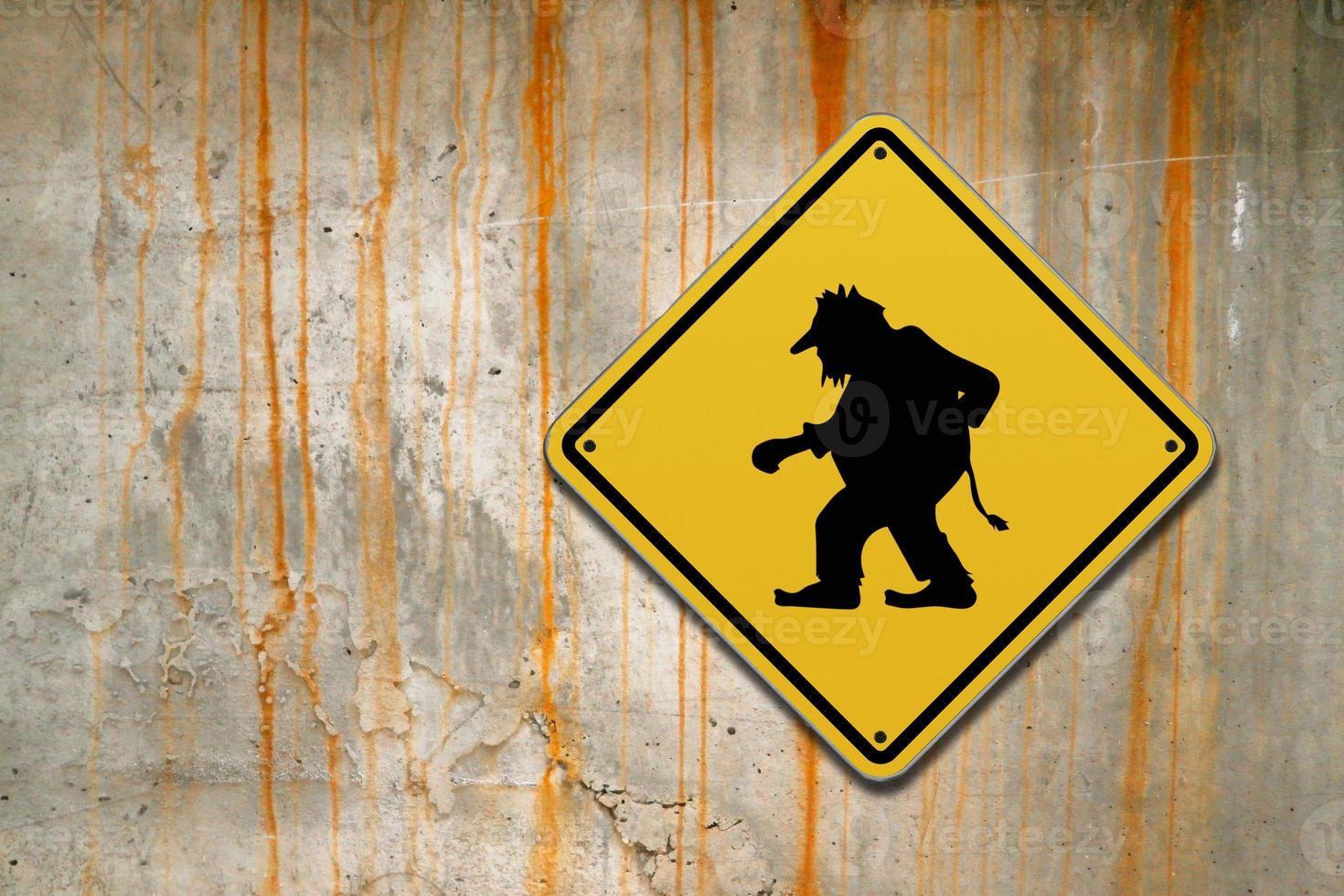 Troll sign on a concrete wall photo