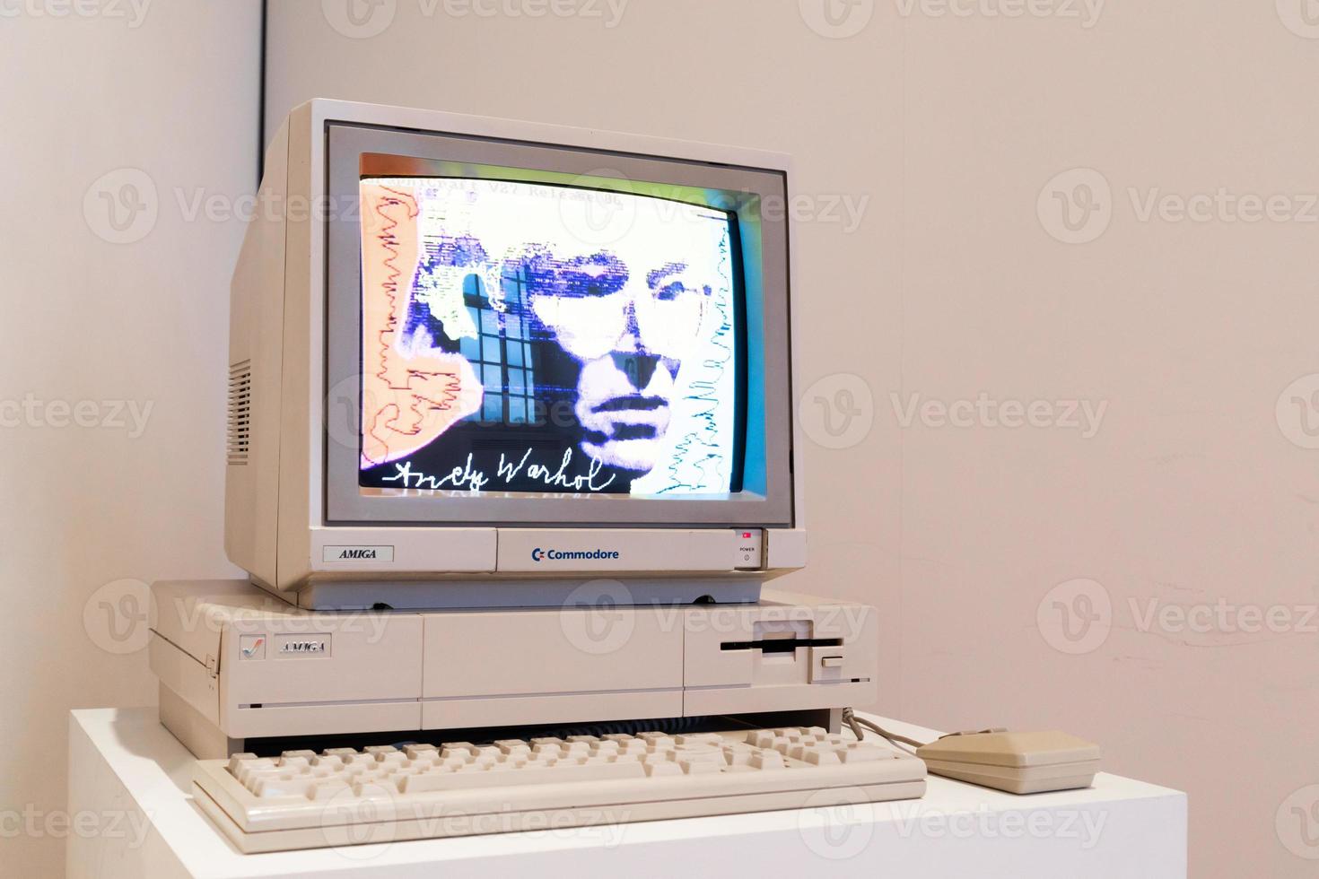 Computer Commodore Amiga 1000 with floppy disk and mouse photo