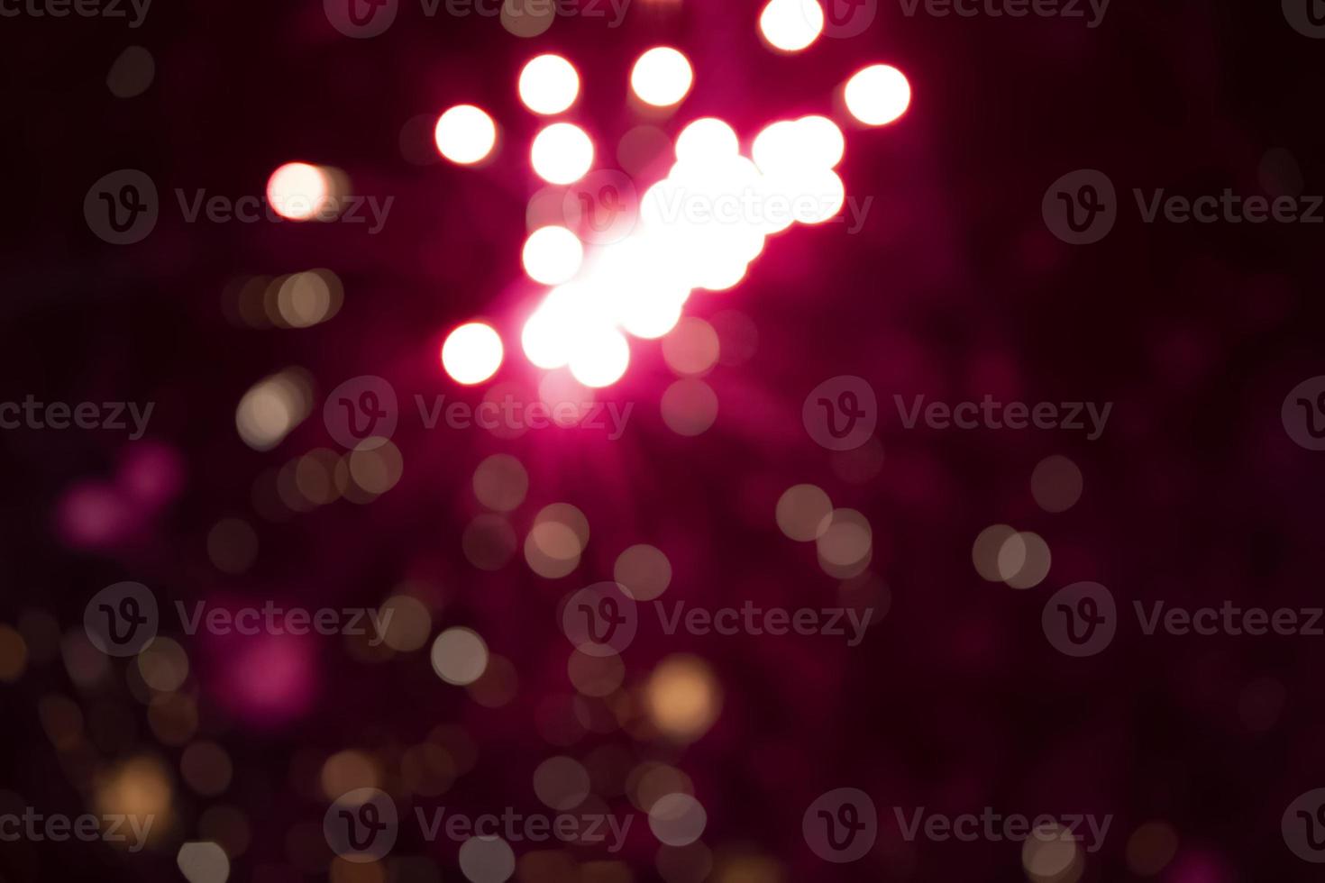 On a black background bokeh from explosions of colorful fireworks. photo