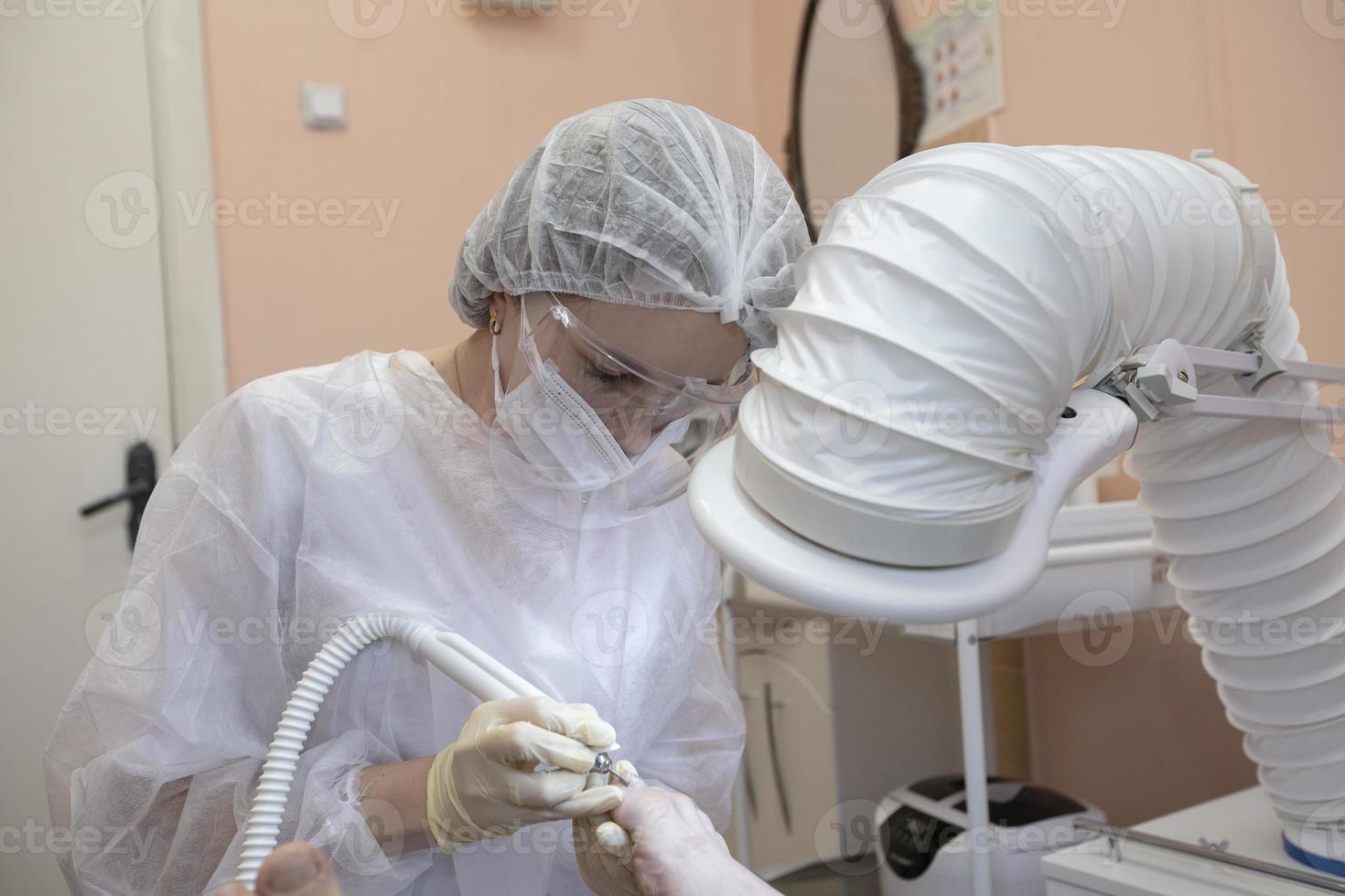 Treatment of toenail fungus in the hospital. photo