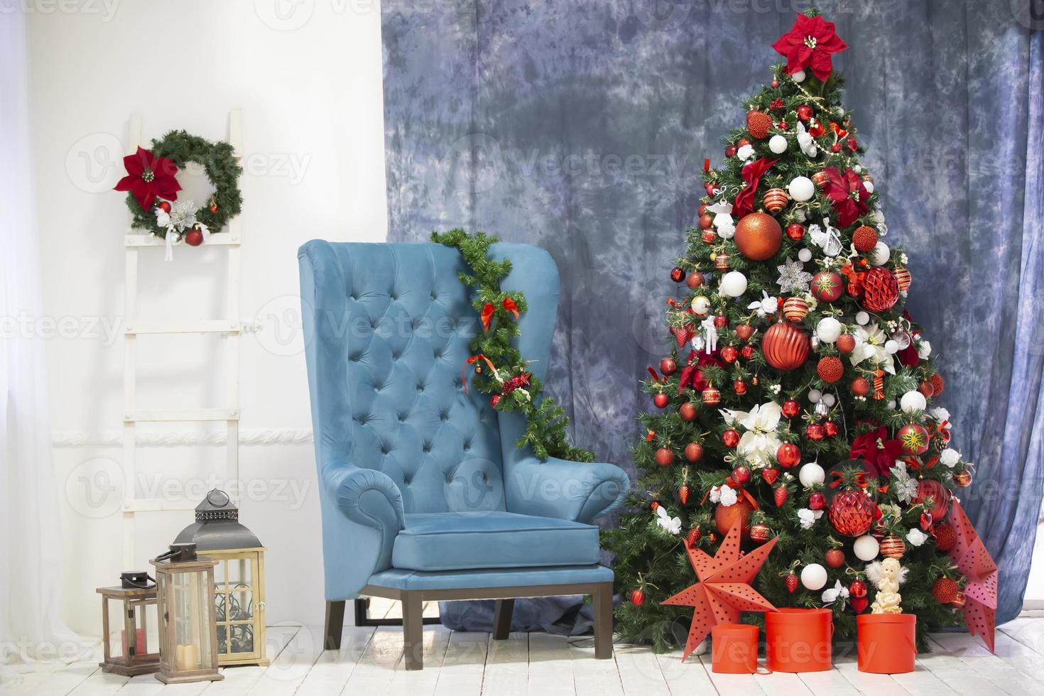 Christmas New Year vintage interior. Christmas tree armchair and decor. photo