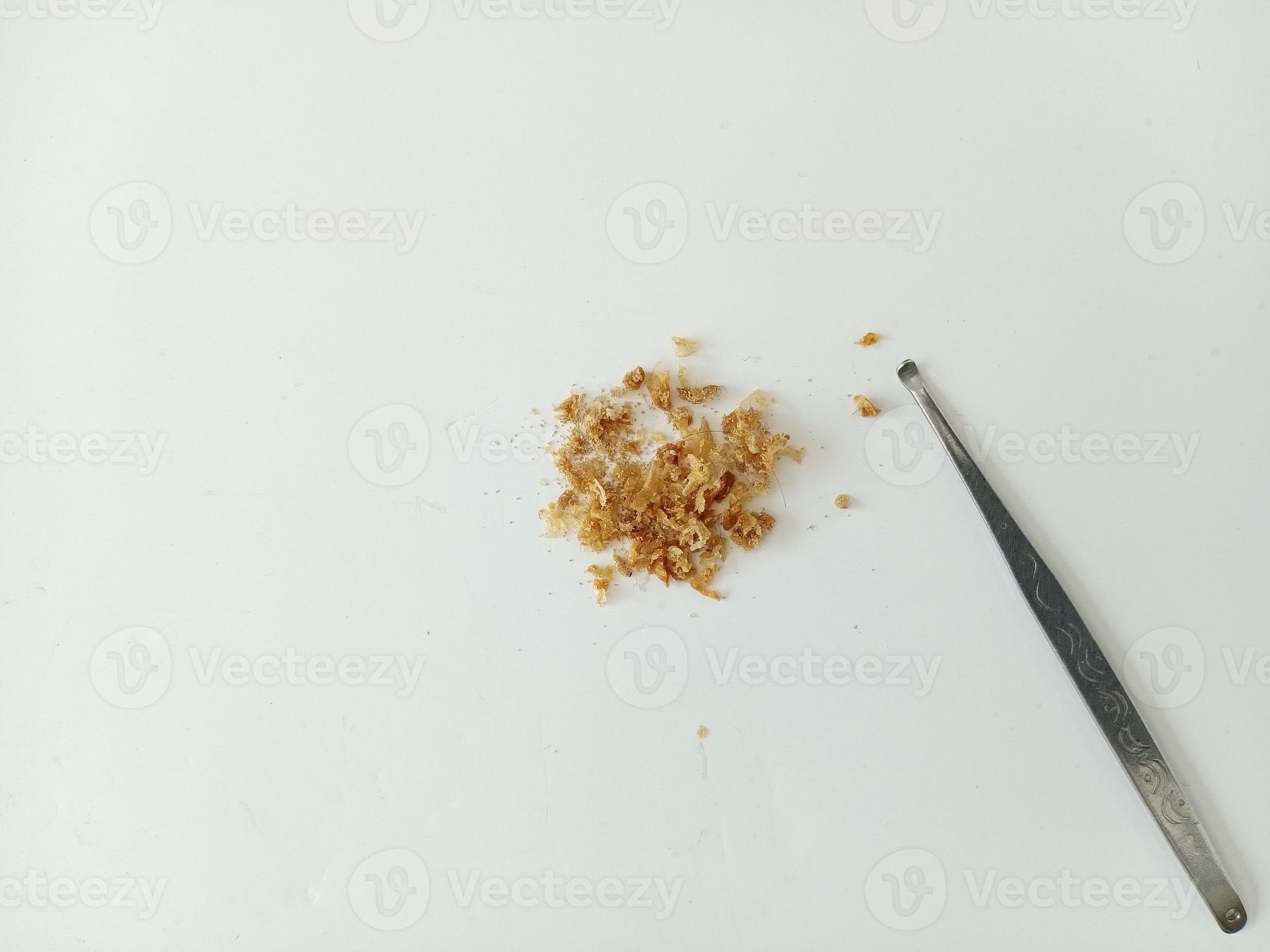 Used ear pick and dry ear wax picking out 20496600 Stock Photo at Vecteezy