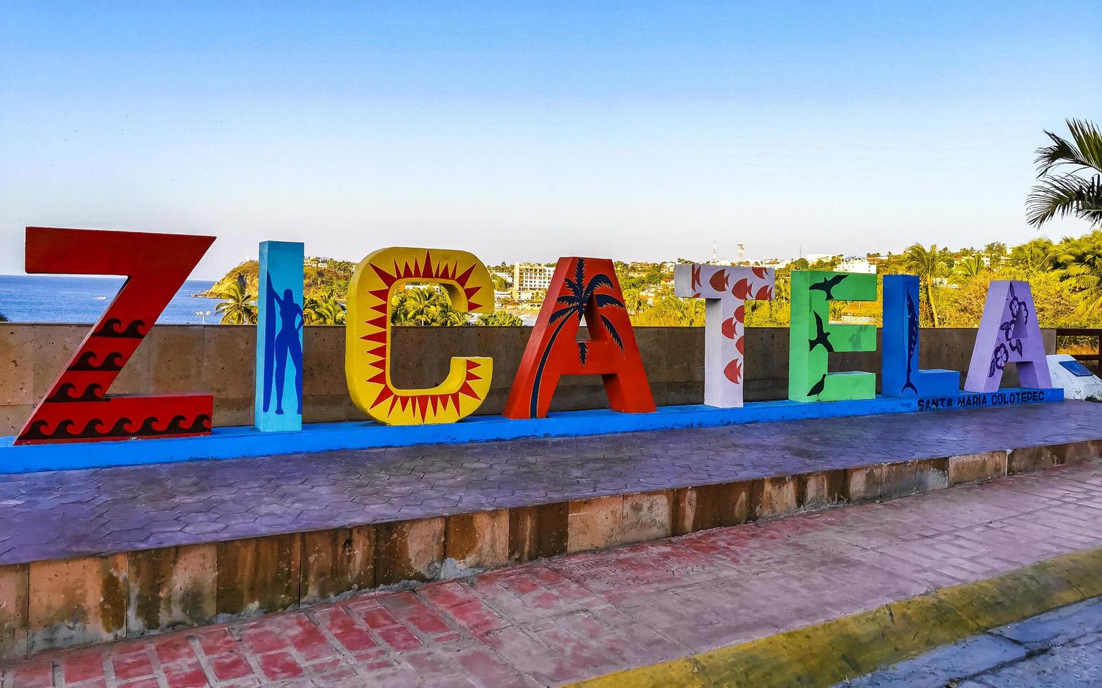 Colorful Zicatela Puerto Escondido lettering sign symbol on beach Mexico. photo