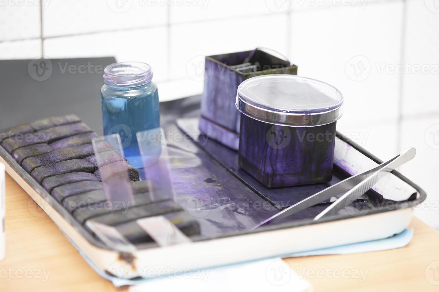 Hematoxylin and eosin solution. Blue solutions in a biochemical laboratory. photo