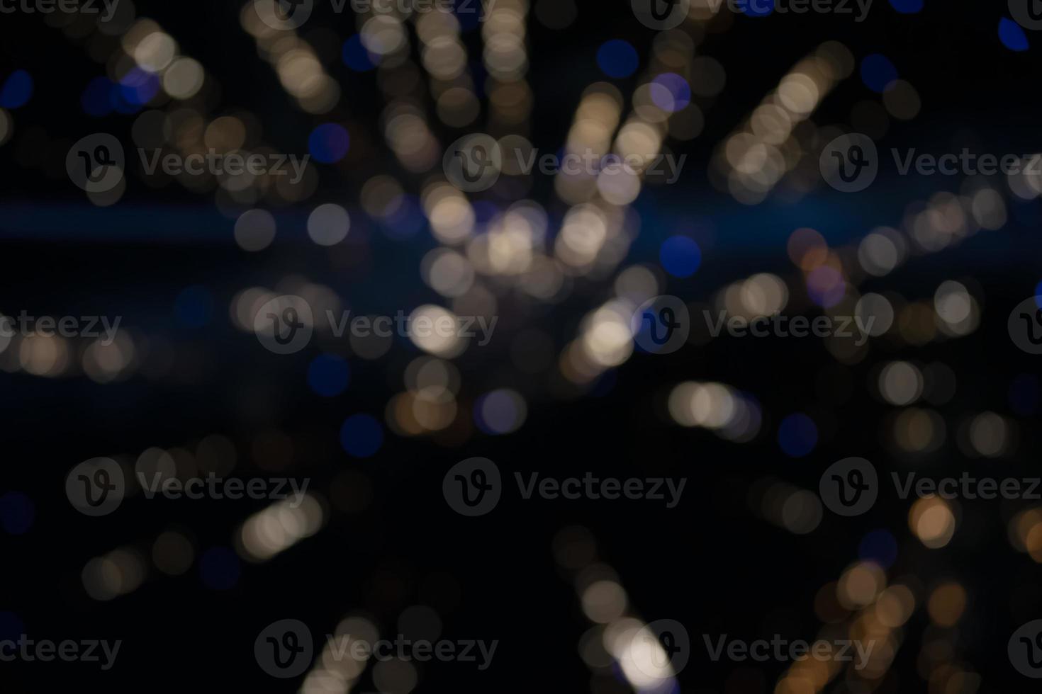 On a black background bokeh from explosions of colorful fireworks. photo