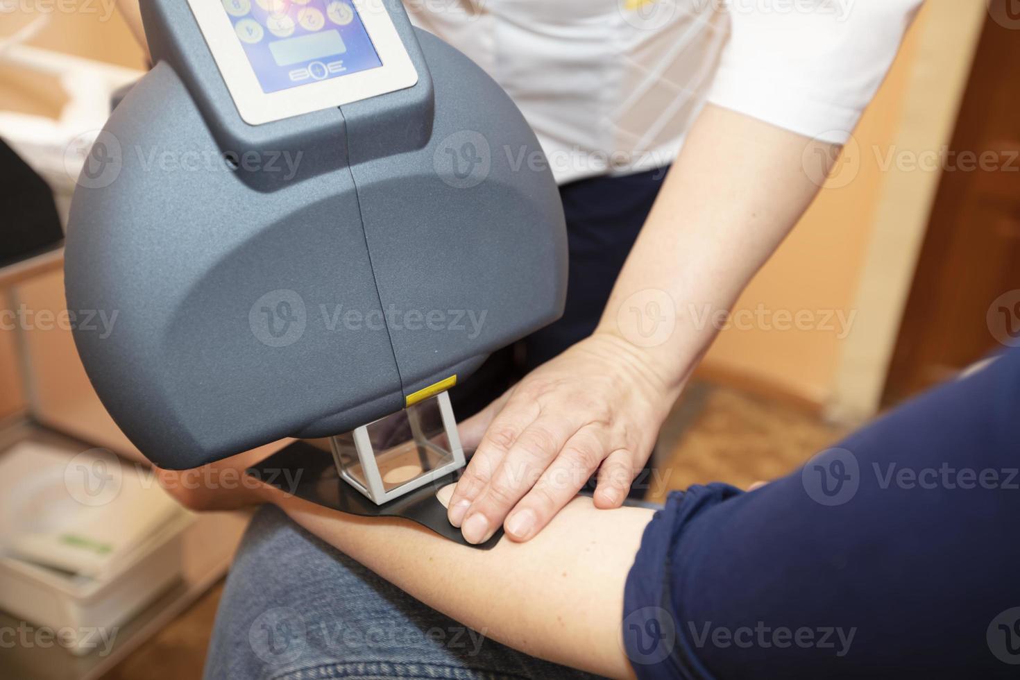 Phototherapy of skin diseases. Treatment of skin diseases such as vitiligo, psoriasis and eczema with a special medical device. photo