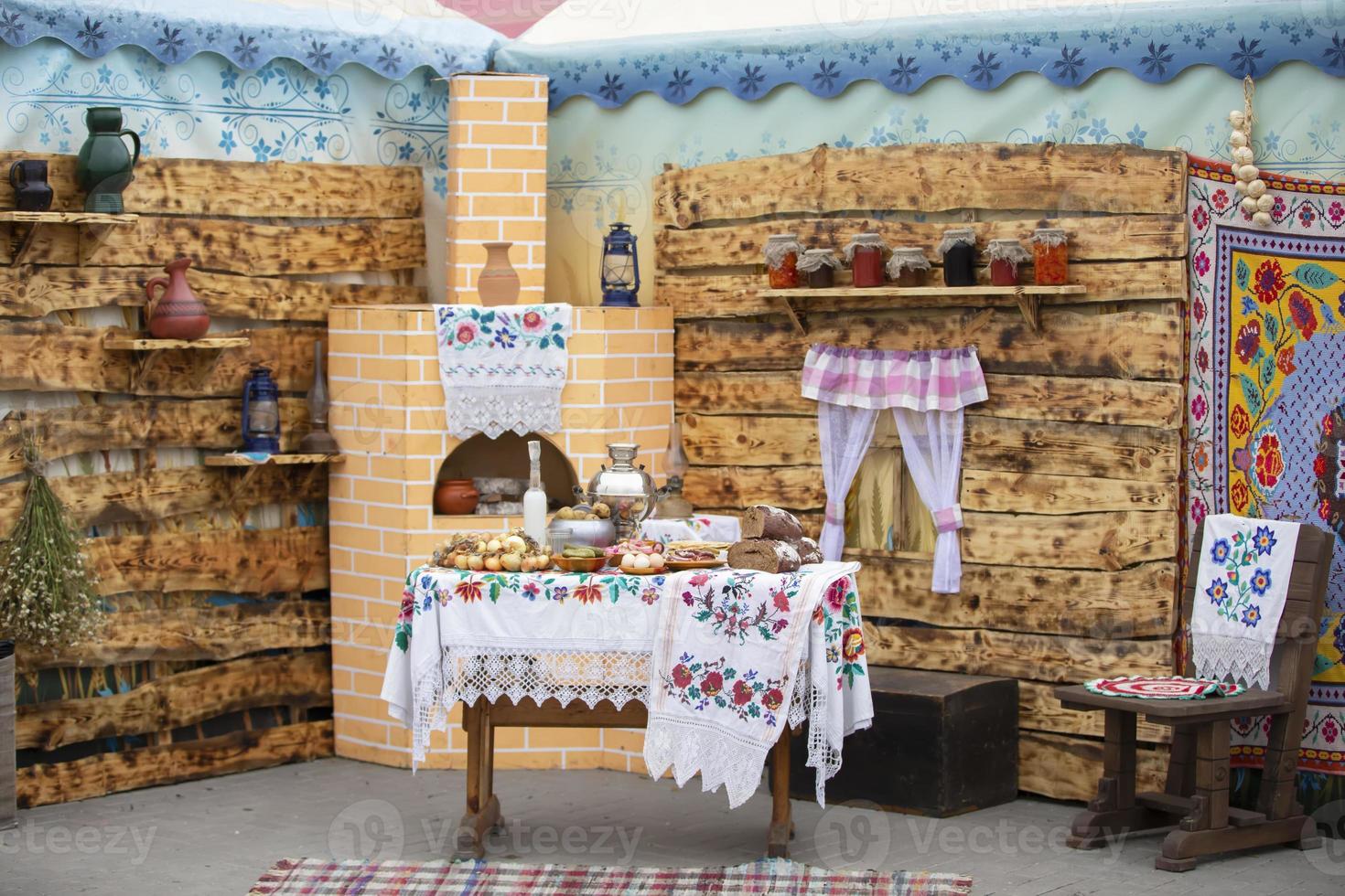 Part of ethnic slavic ukrainian or belarusian interior with national food. photo