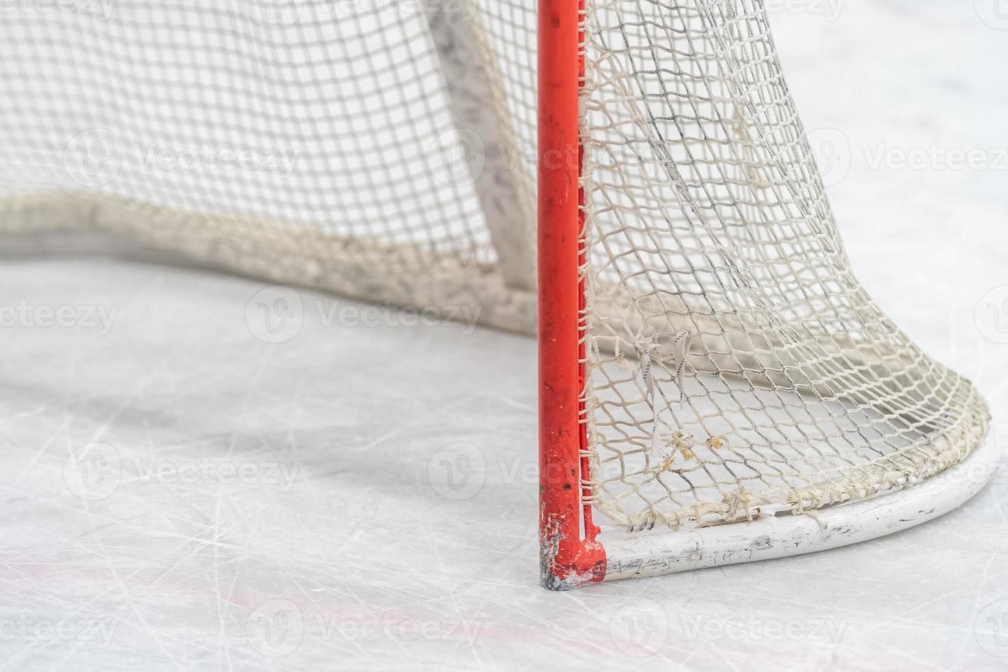 detail of a hockey goal on the ice photo