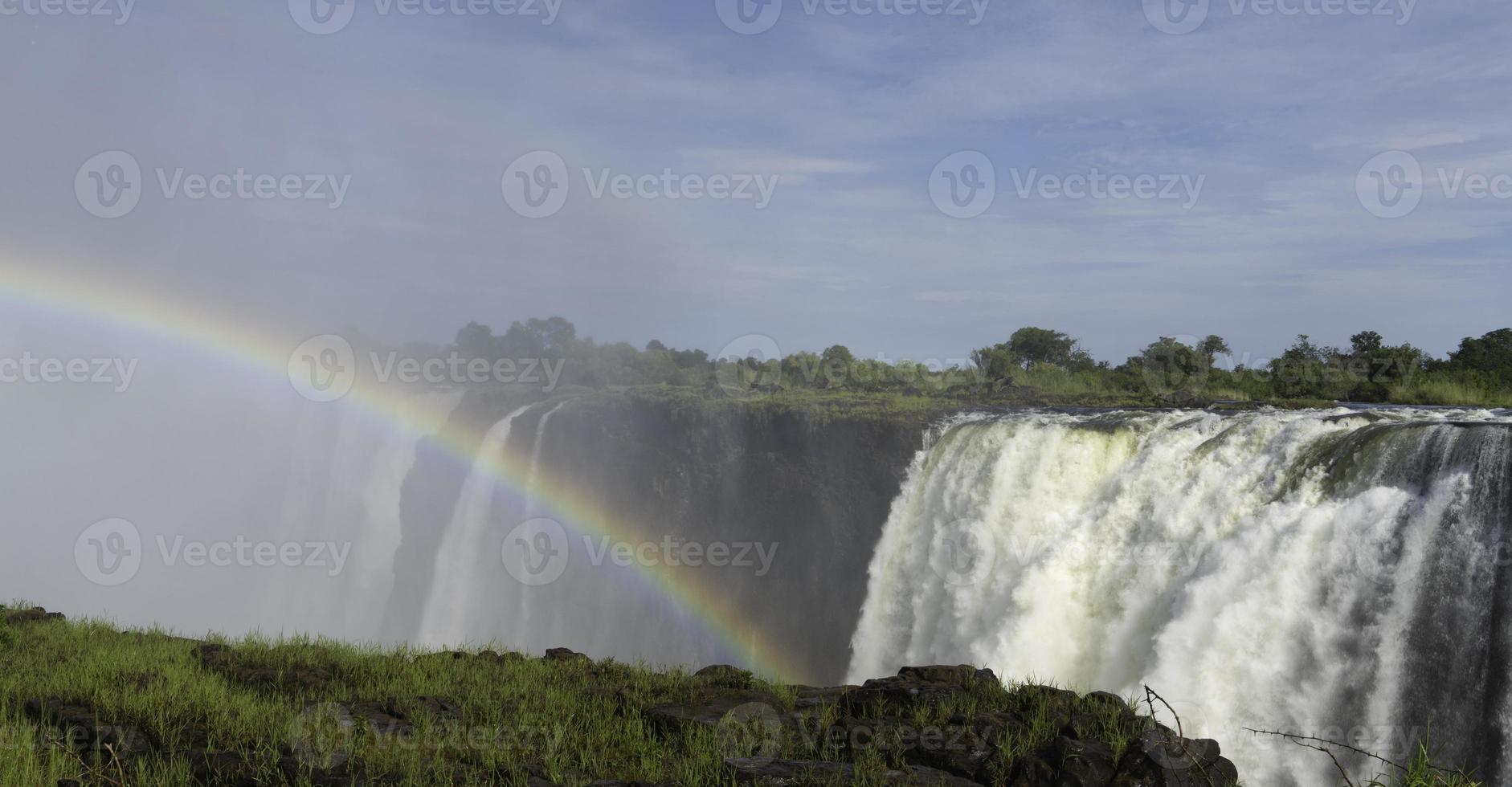 A rainbow over Victoria Falls in Zimbabwe. photo