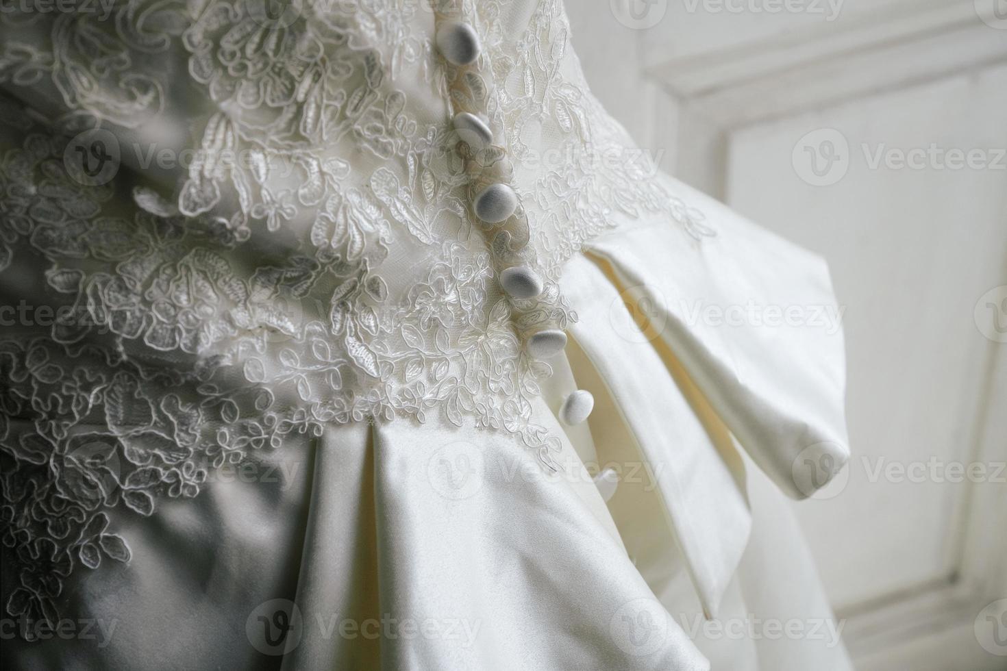 Girl in a wedding dress close-up photo