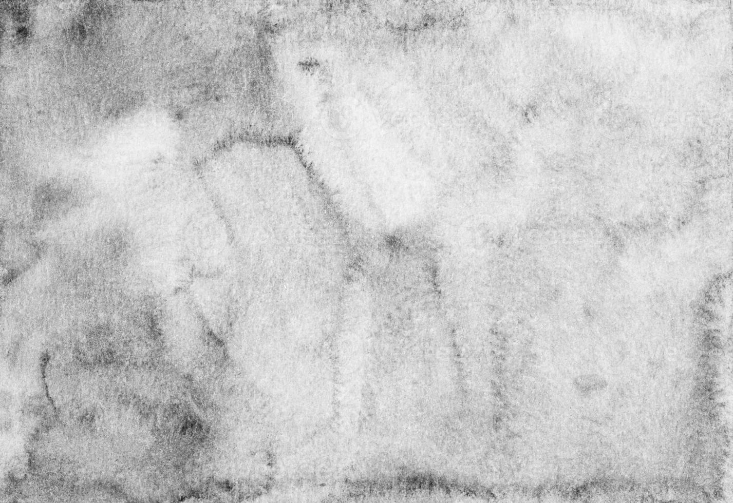 Watercolor old light gray background texture. Grey stains on paper overlay. Monochrome textured backdrop photo