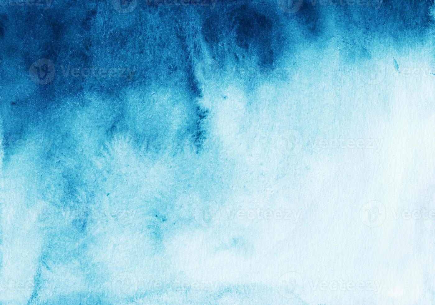Watercolor blue and white gradient background hand painted. Stains on paper. photo