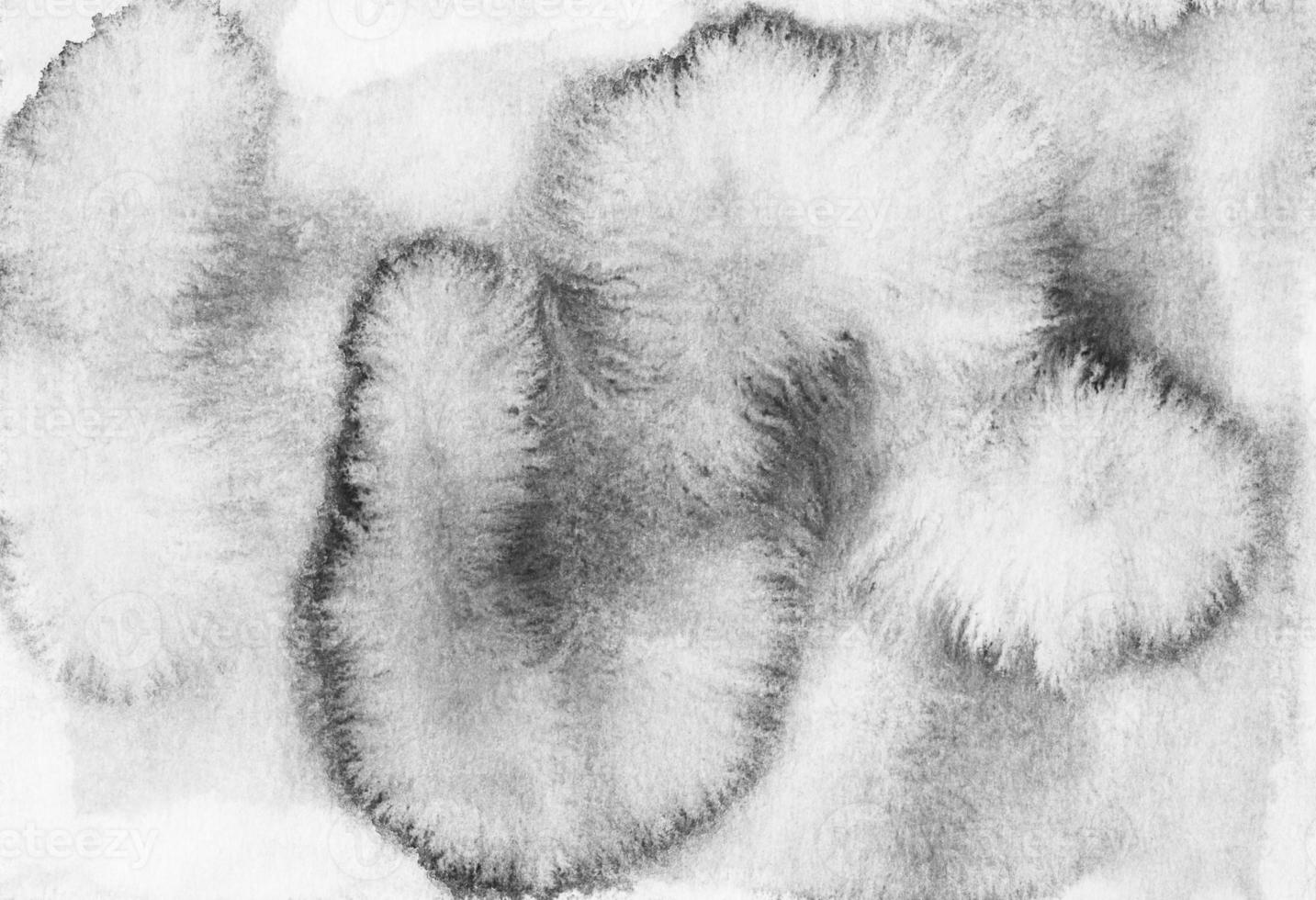 Watercolor light gray background texture. Black and white stains on paper. Monochrome watery backdrop. photo