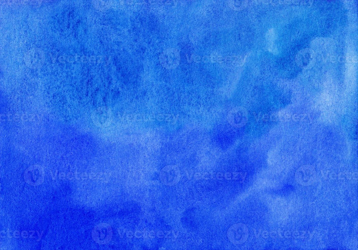 Watercolor deep blue background texture hand painted. Aquarelle azure blue abstract backdrop. Stains on paper photo