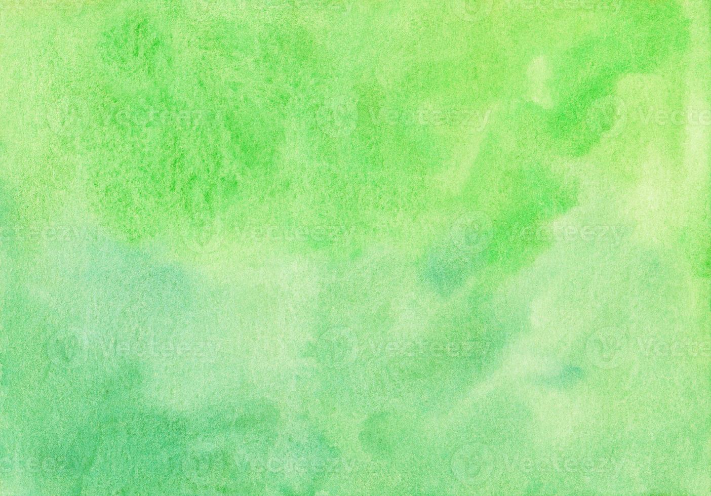 Watercolor light green background texture. Aquarelle kelly green color backdrop. Stains on paper photo