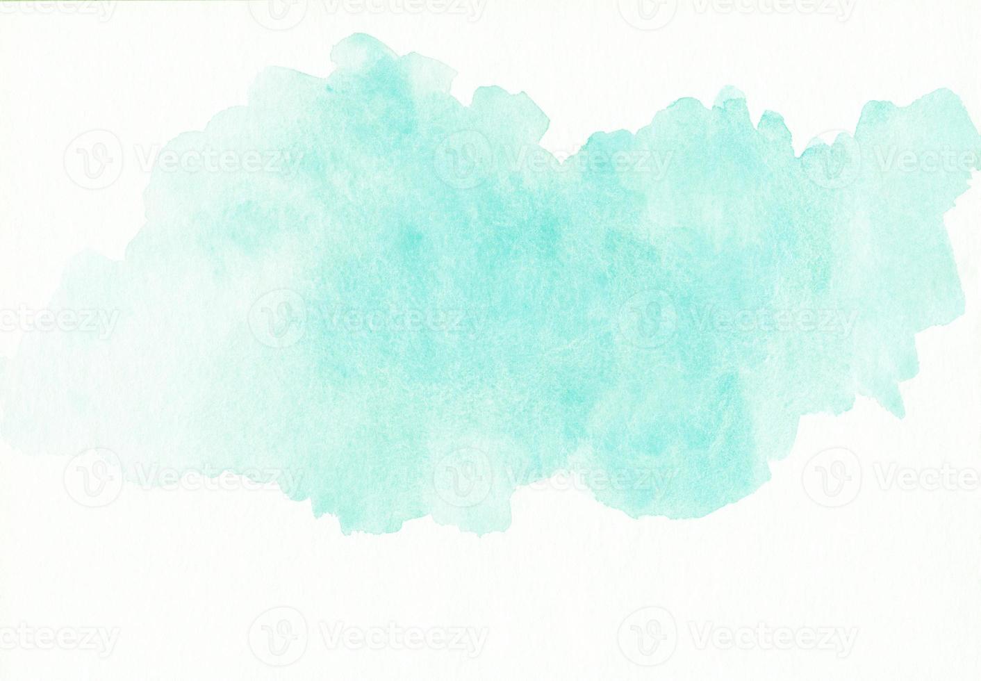 Watercolor light cyan blue spot on white background with space for text. Stains on paper. photo