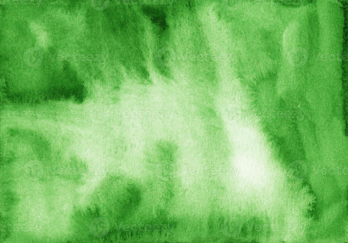 Watercolor spring green background texture with space for text. Aquarelle spring green color backdrop. Brush strokes on paper. photo