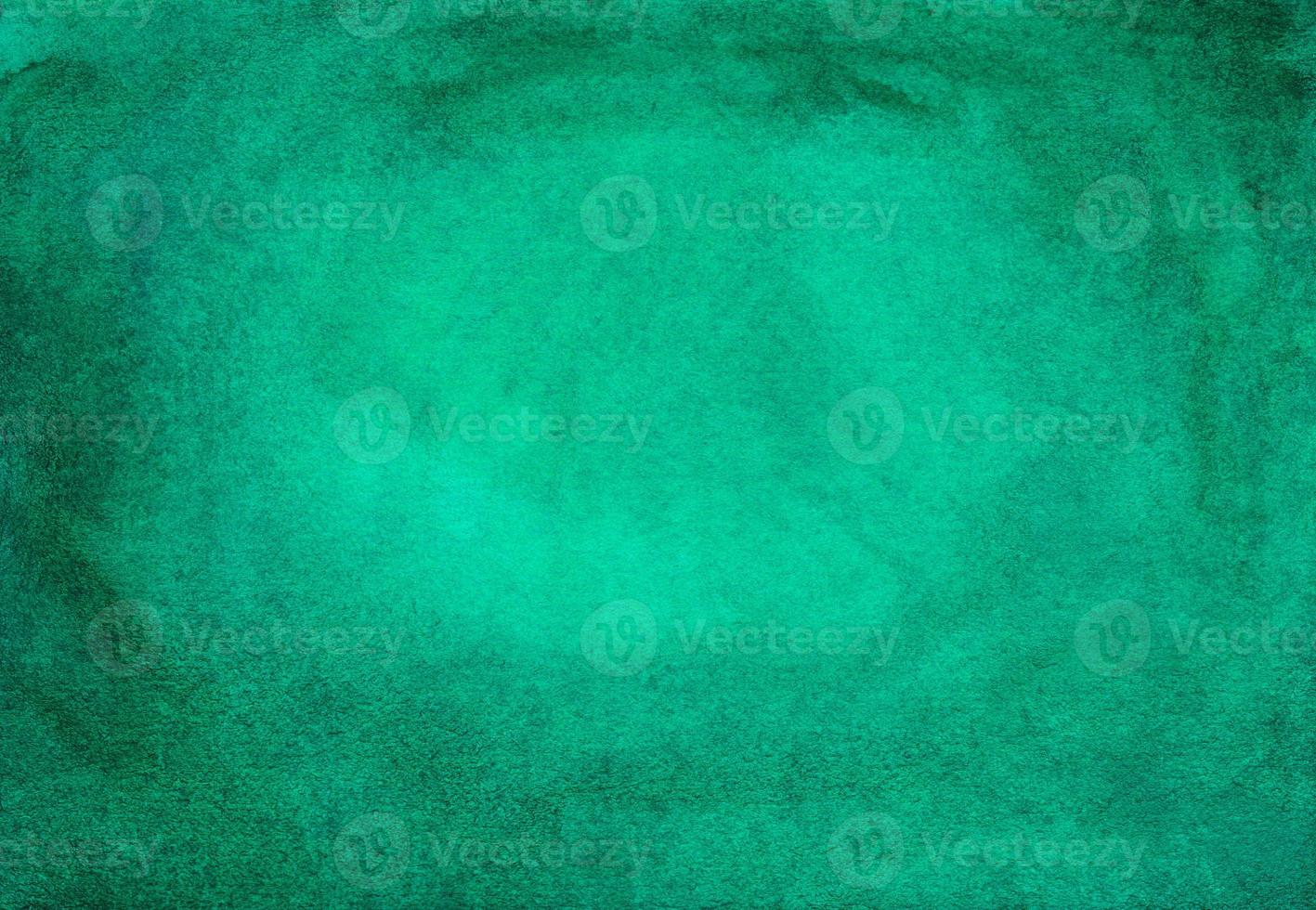 Watercolor emerald background texture painting. Watercolour abstract deep green backdrop. Stains on paper. photo