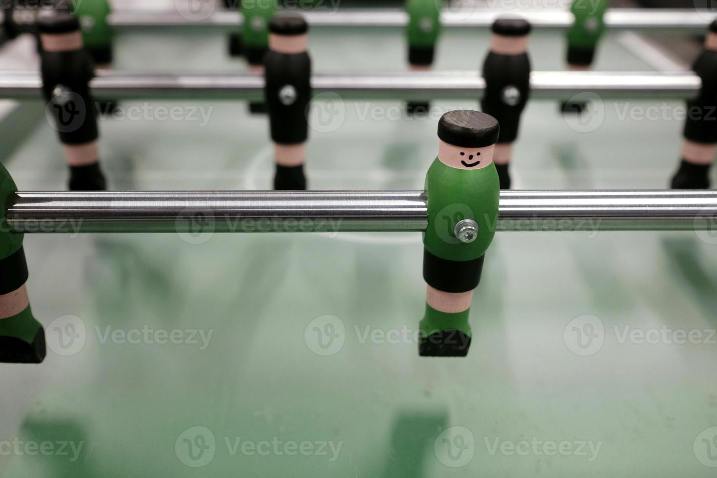 Selective focus on football table player photo