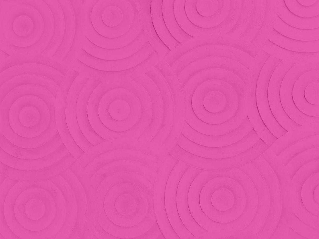 Pink stone convex circle wall pattern texture rough surface appearance stacked together in an orderly manner suitable ,cement for background, or use it as wallpaper in design. photo