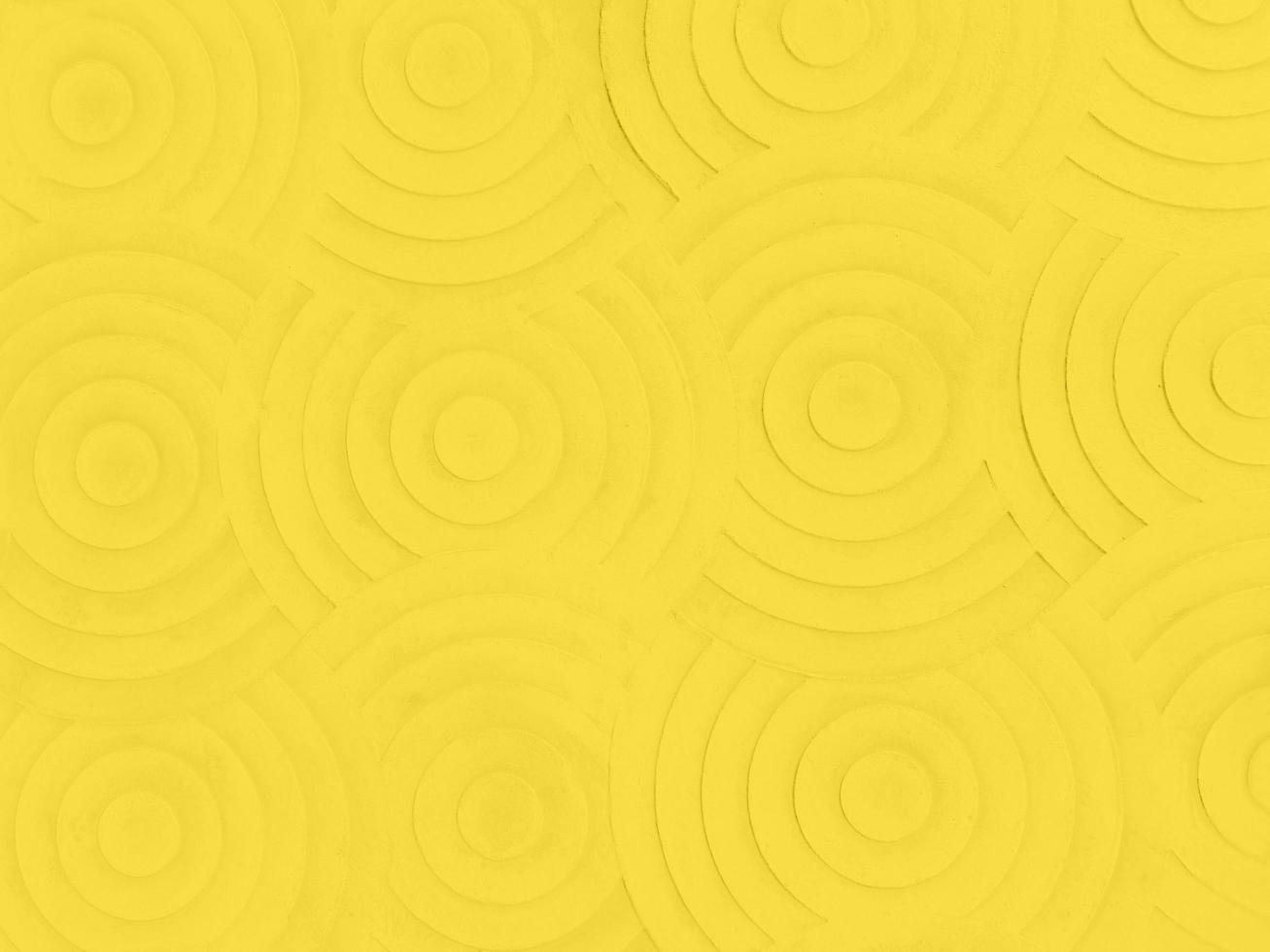 Yellow stone convex circle wall pattern texture rough surface appearance stacked together in an orderly manner suitable ,cement for background, or use it as wallpaper in design. photo