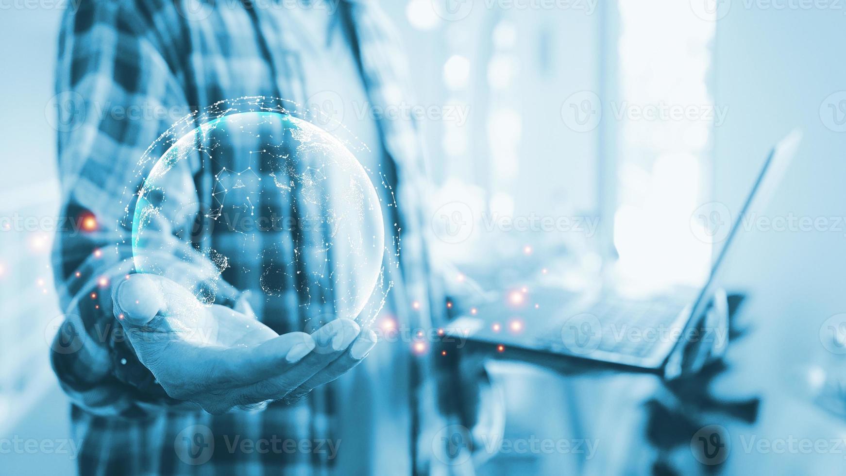 Businessman holding Global network connection. Big data analytics and business intelligence concept. World map point and line composition concept of global business.Digital link tech. photo